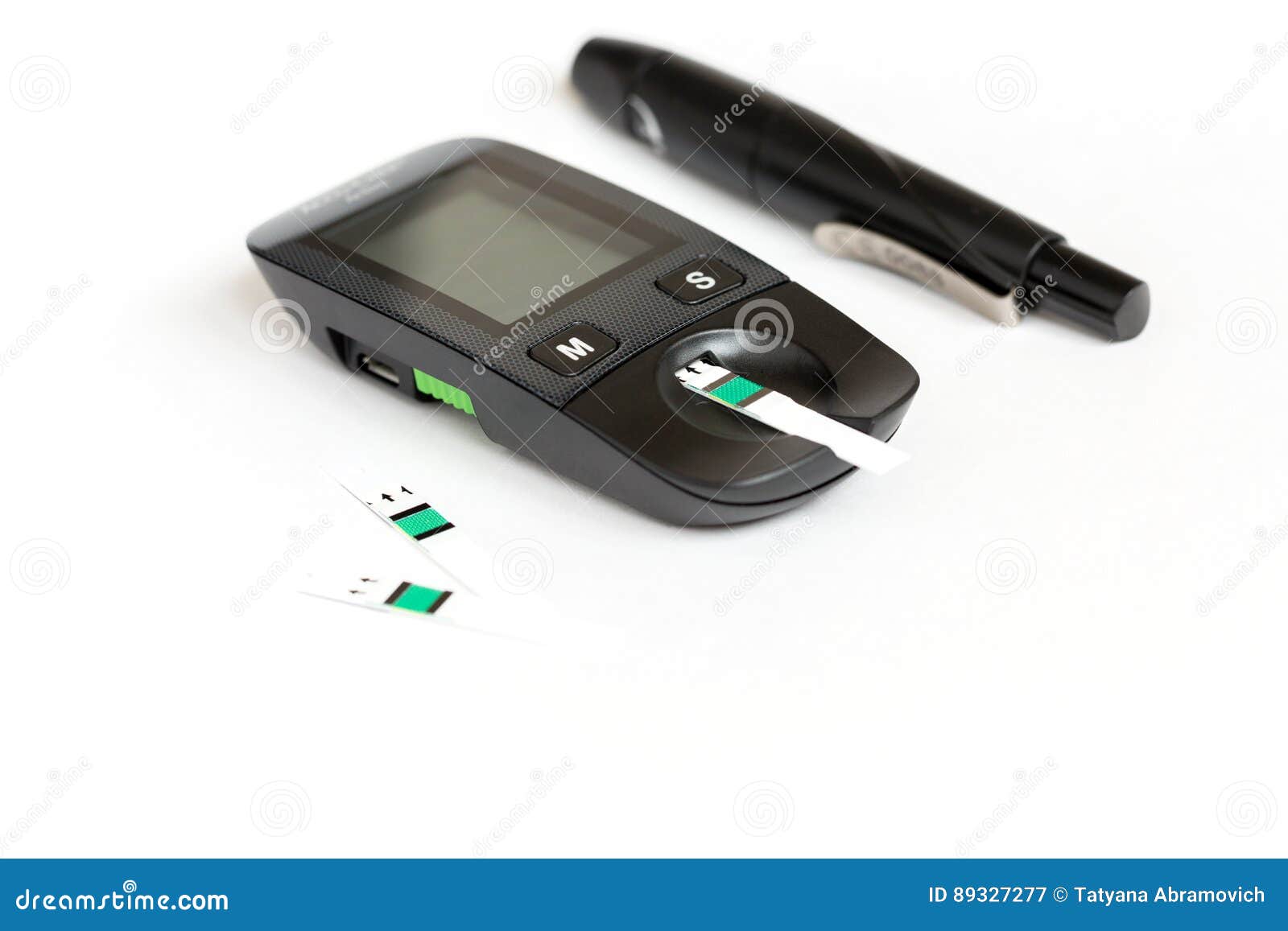 set glucometer and syringe with diabetes indicator strips for blood glucose testing  on white background