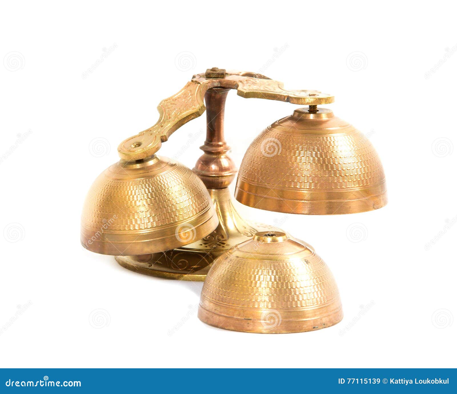 set of gold handbells on white background
