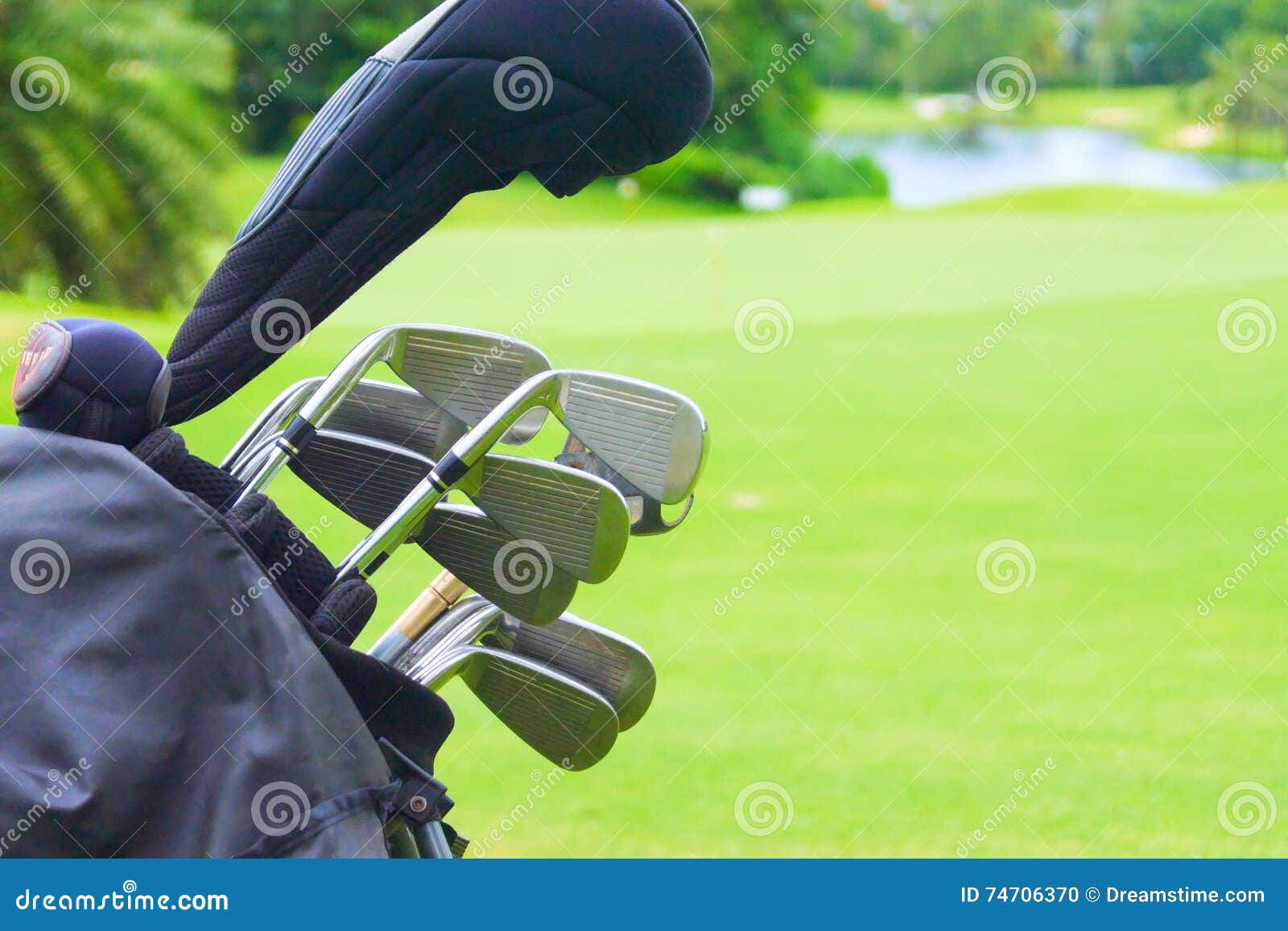 Set of Golf Clubs Over Green Field Background Stock Photo Image of