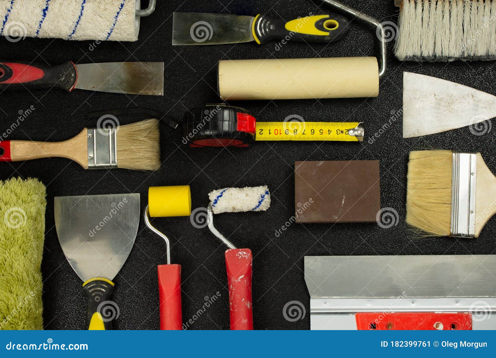 Set of House Painter Tools on Black Background, Top View, Flat Lay