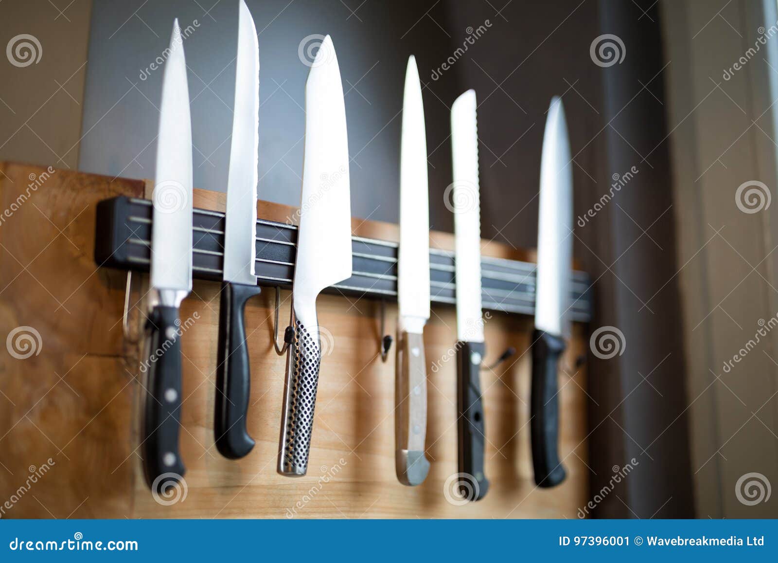 Set of Kitchen Knives Hanging on the Wall Stock Image Image of silver