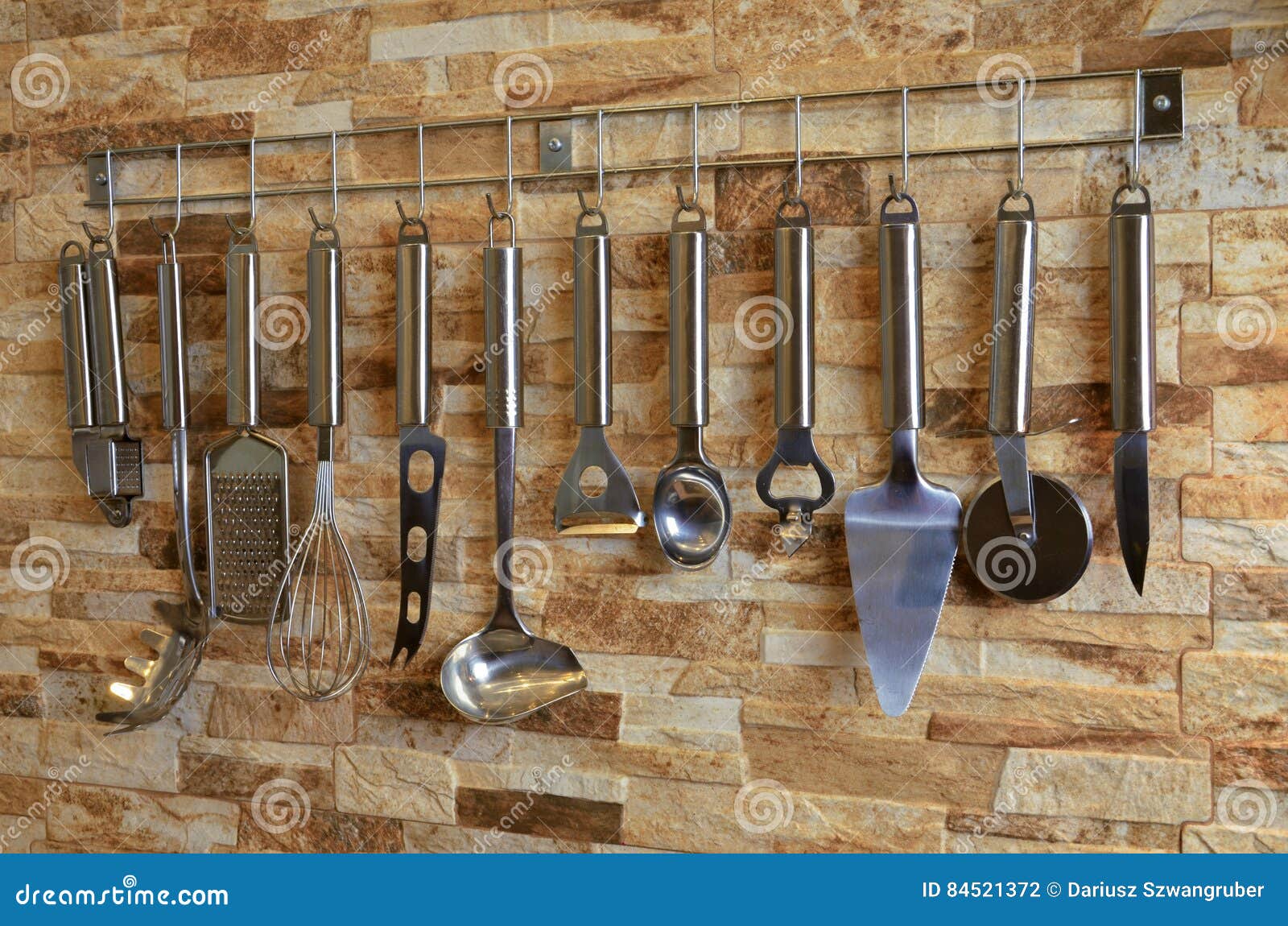 Set of Kitchen Utensils Hanging on the Wall Stock Photo Image of