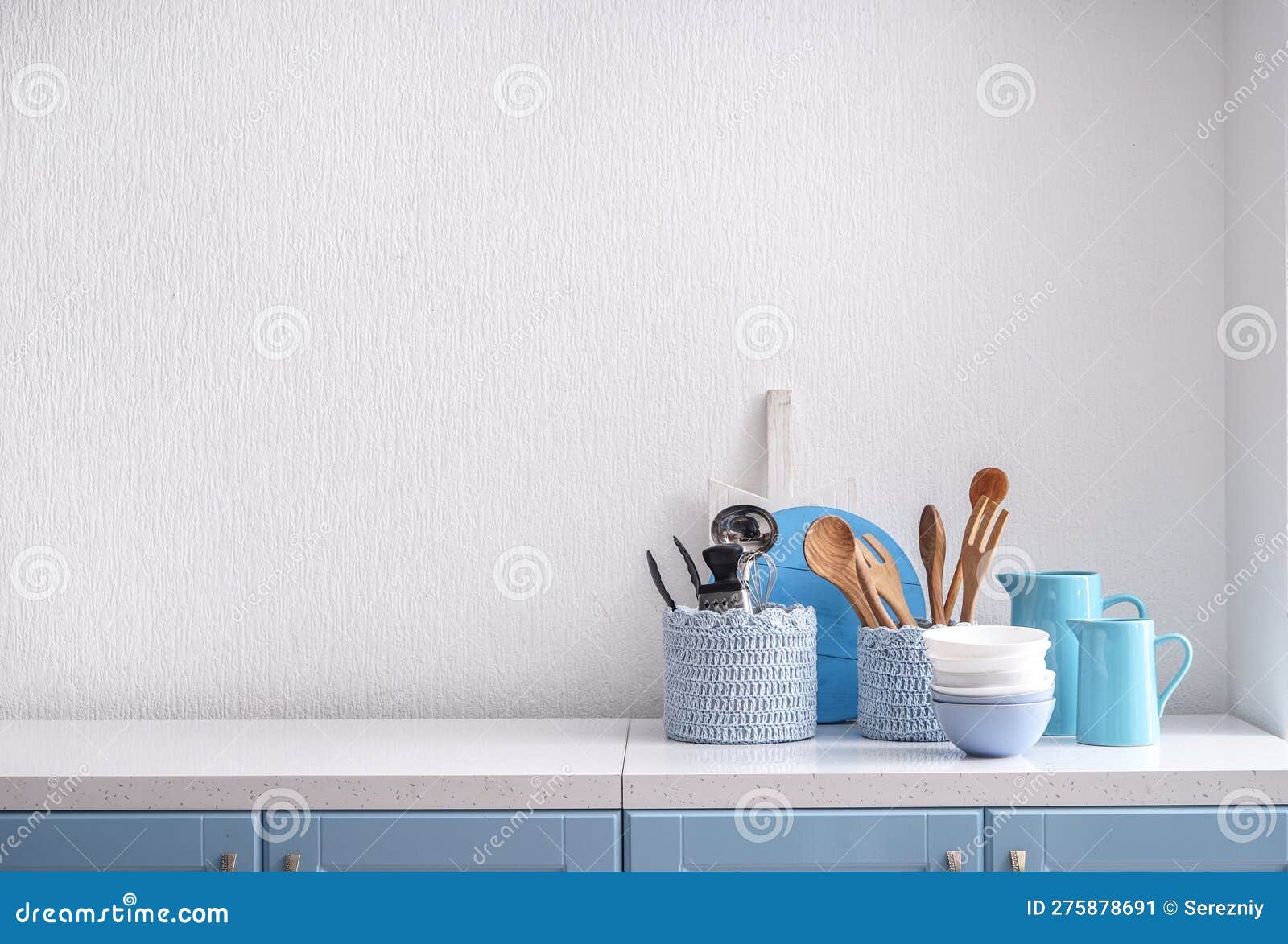 Set of Kitchenware on Table Near White Wall Stock Image Image of