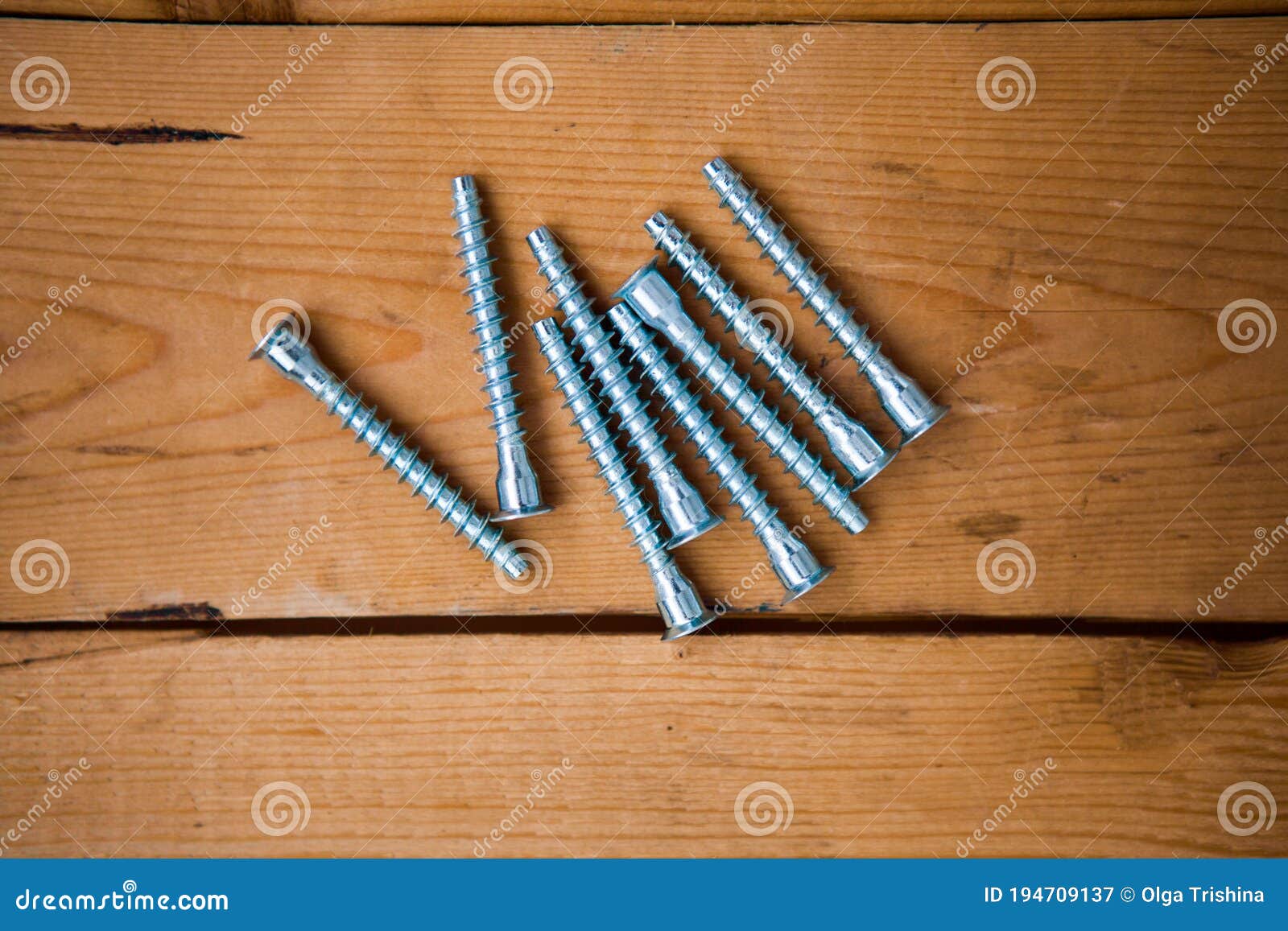 set of metalware on the wooden background