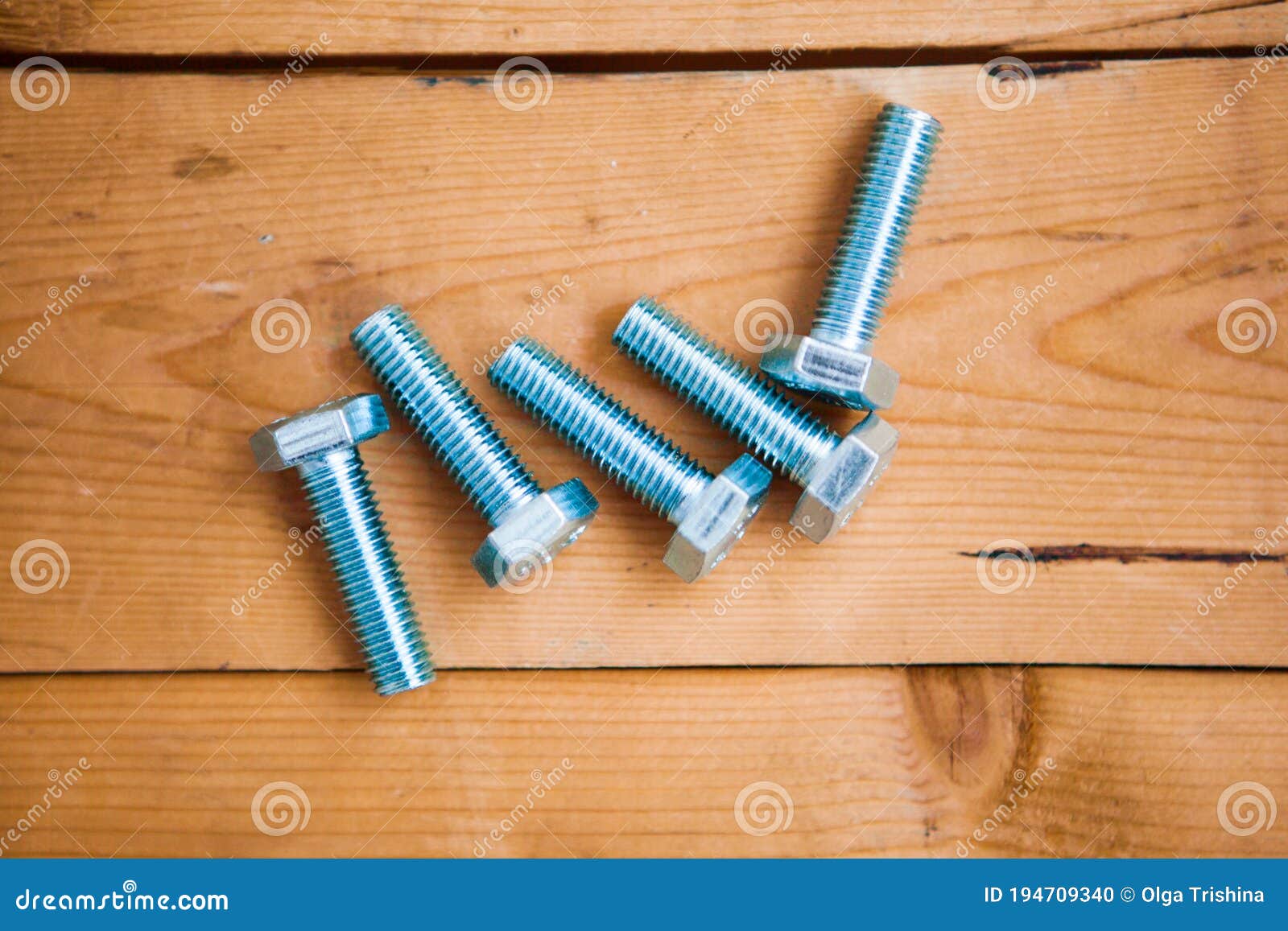 set of metalware on the wooden background