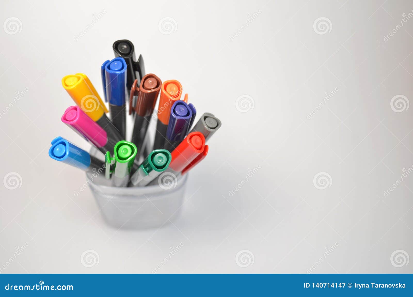 Set of Multi-colored Pens Standing in a Transparent Glass, Top View on Gray  Background, Horysontally with Copyspace Stock Image - Image of supplies,  creative: 140714147