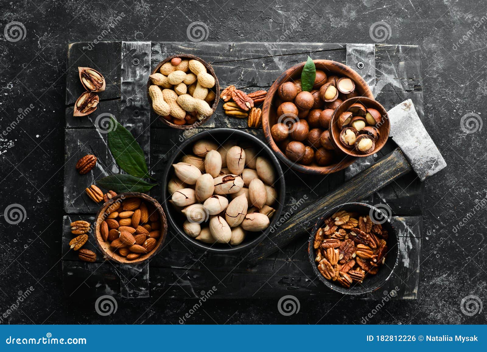 Set of Nuts. Macadamia Nuts, Pecans, Peanuts and Almonds Stock Photo