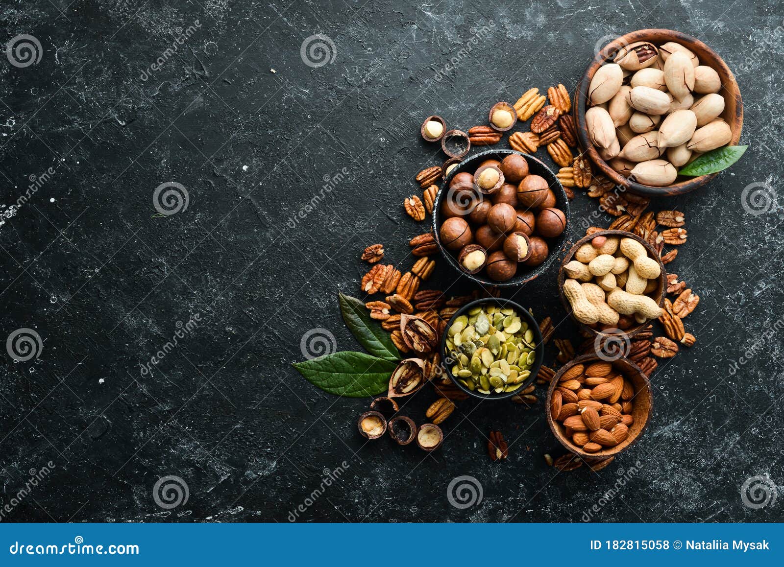 Set of Nuts. Macadamia Nuts, Pecans, Peanuts and Almonds Stock Photo