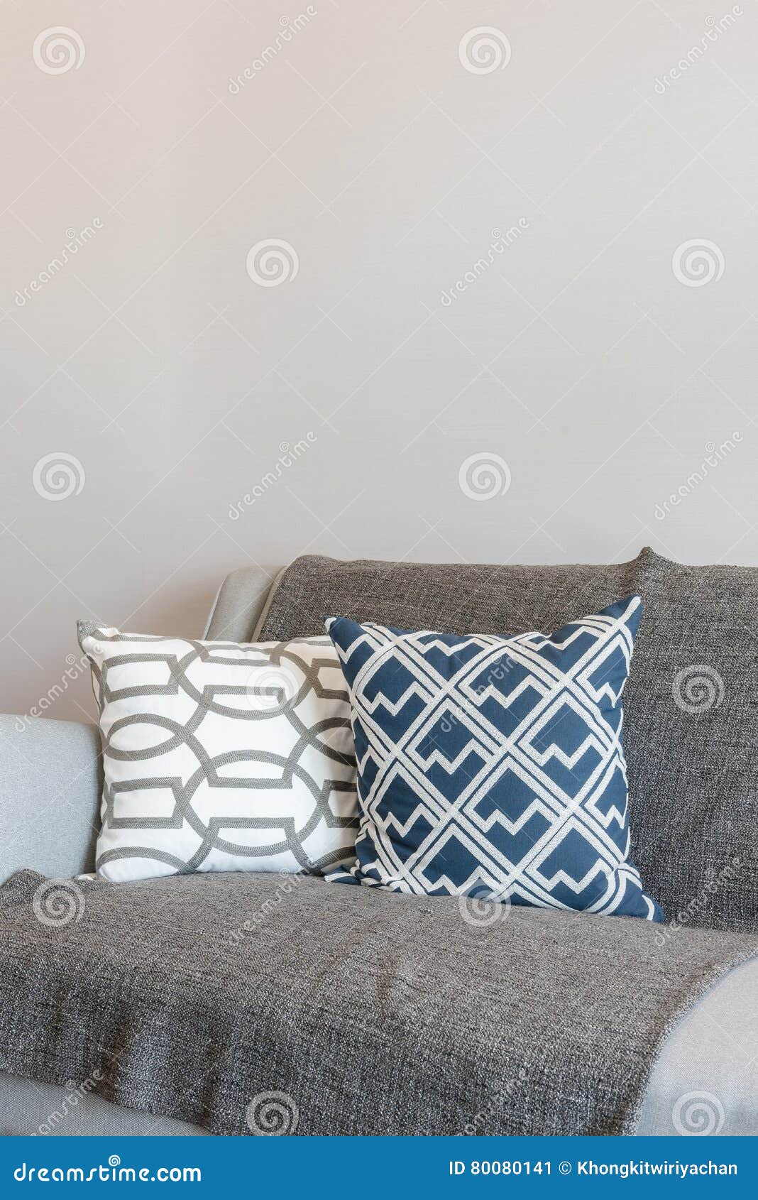 Set of Pillows Onmodern Grey Sofa in Modern Living Room Stock Image