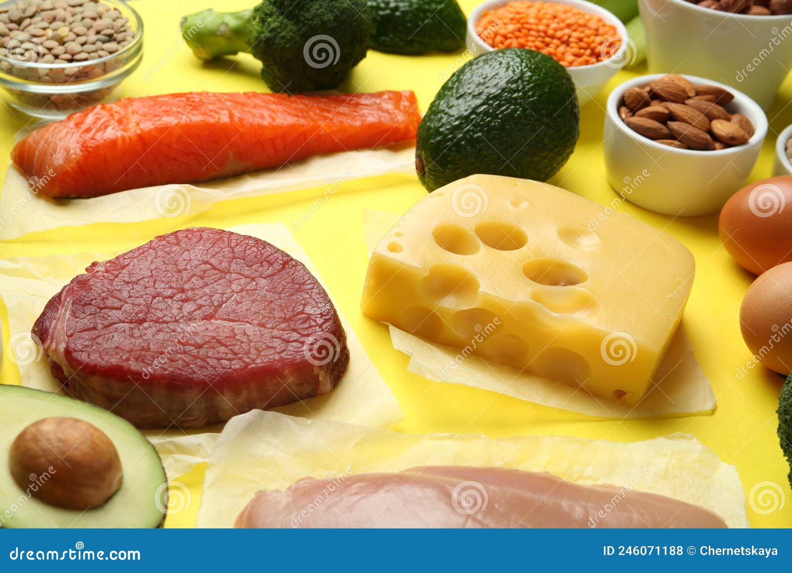 Set of Products Rich in Amino Acids on Yellow Background Stock Photo