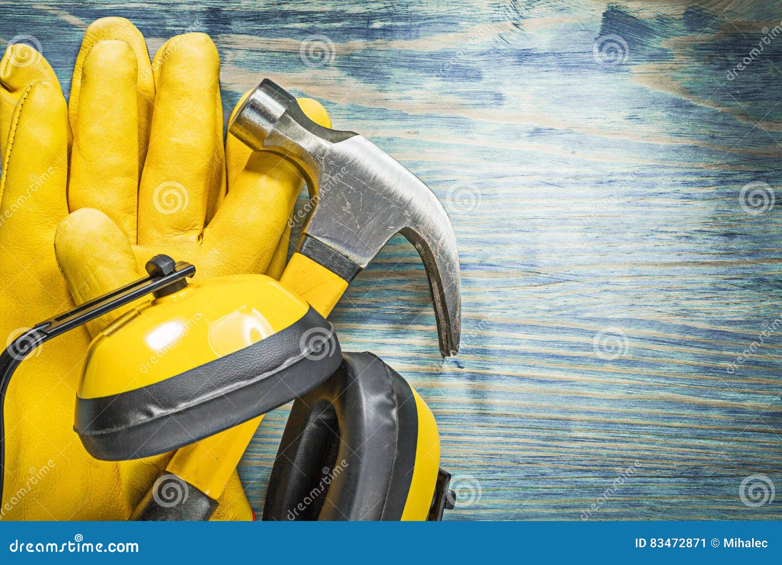 Set of Protective Workwear Claw Hammer on Wooden Board Construct Stock