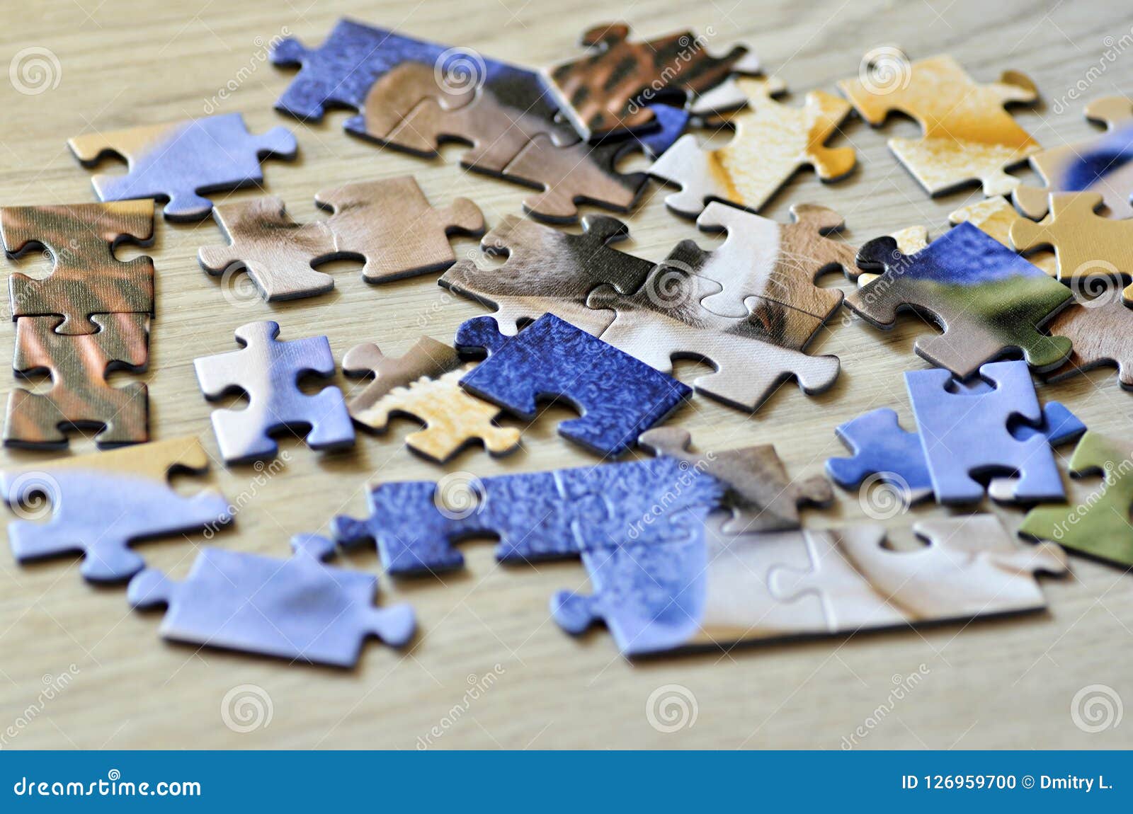 a set of puzzles on wooden floor