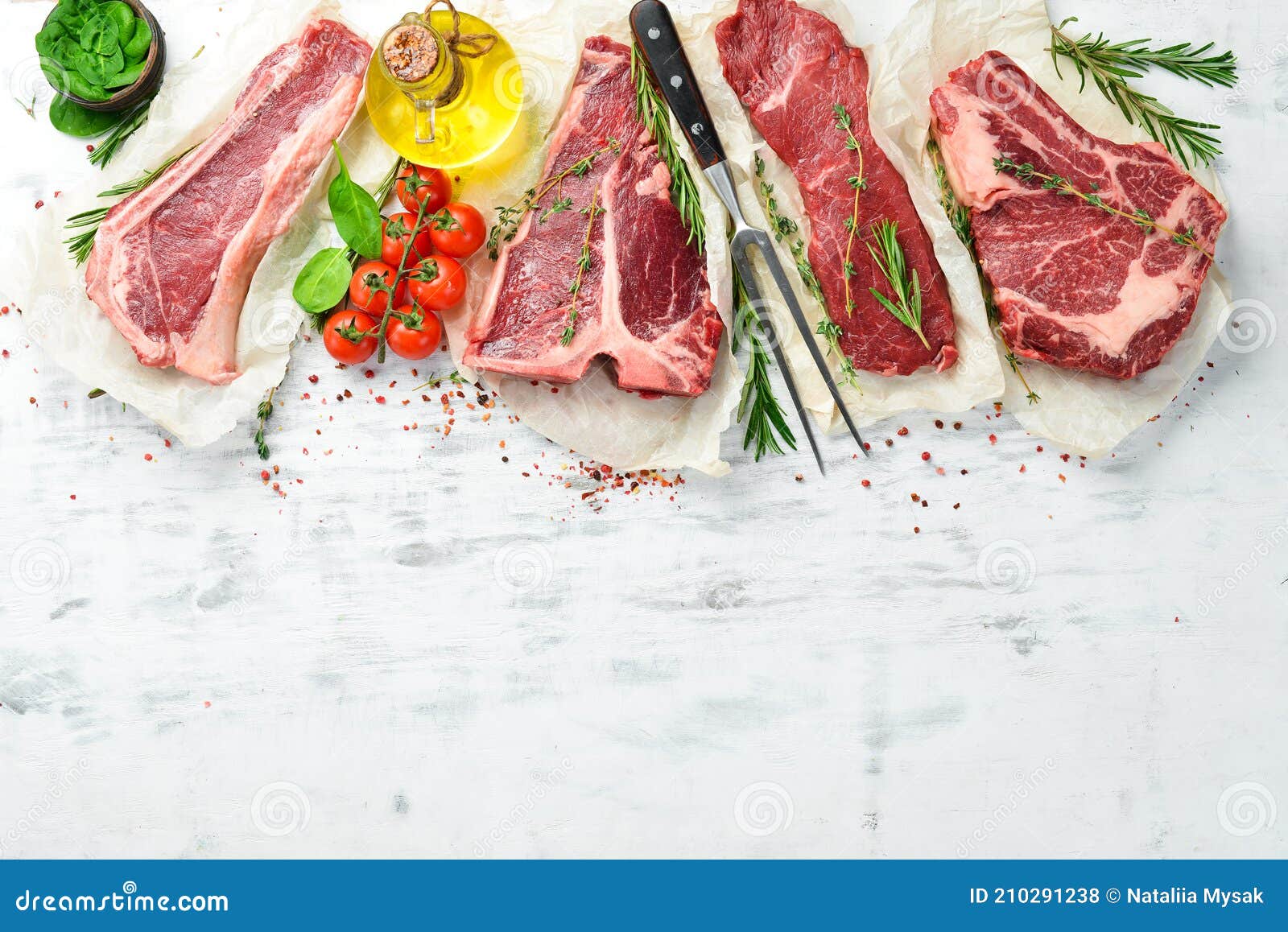 Set of Raw Steaks Tbone, Striploin, Rib Eye, New York Steak. Stock