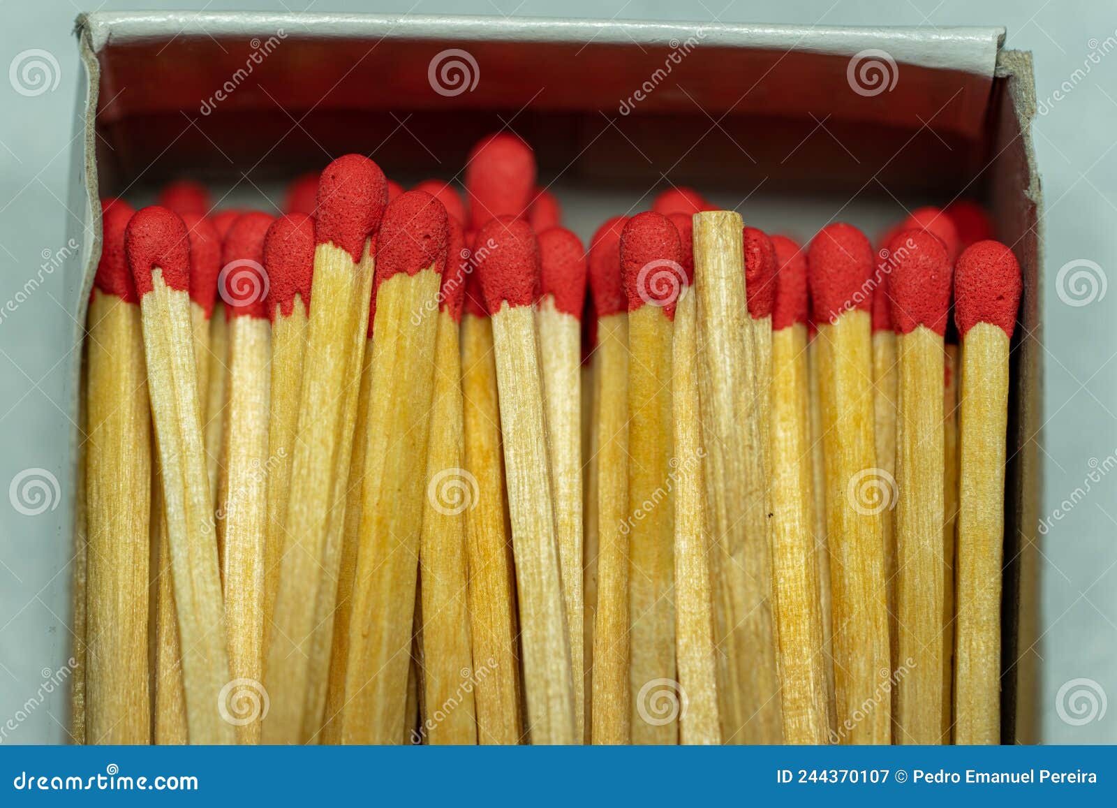 set of several red-headed matchsticks with one upside down, or without a head.