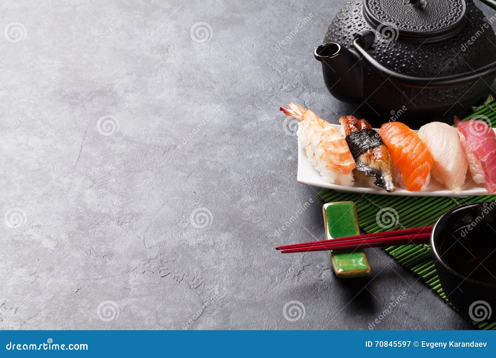 Set of sushi and green tea stock image. Image of nigiri 70845597
