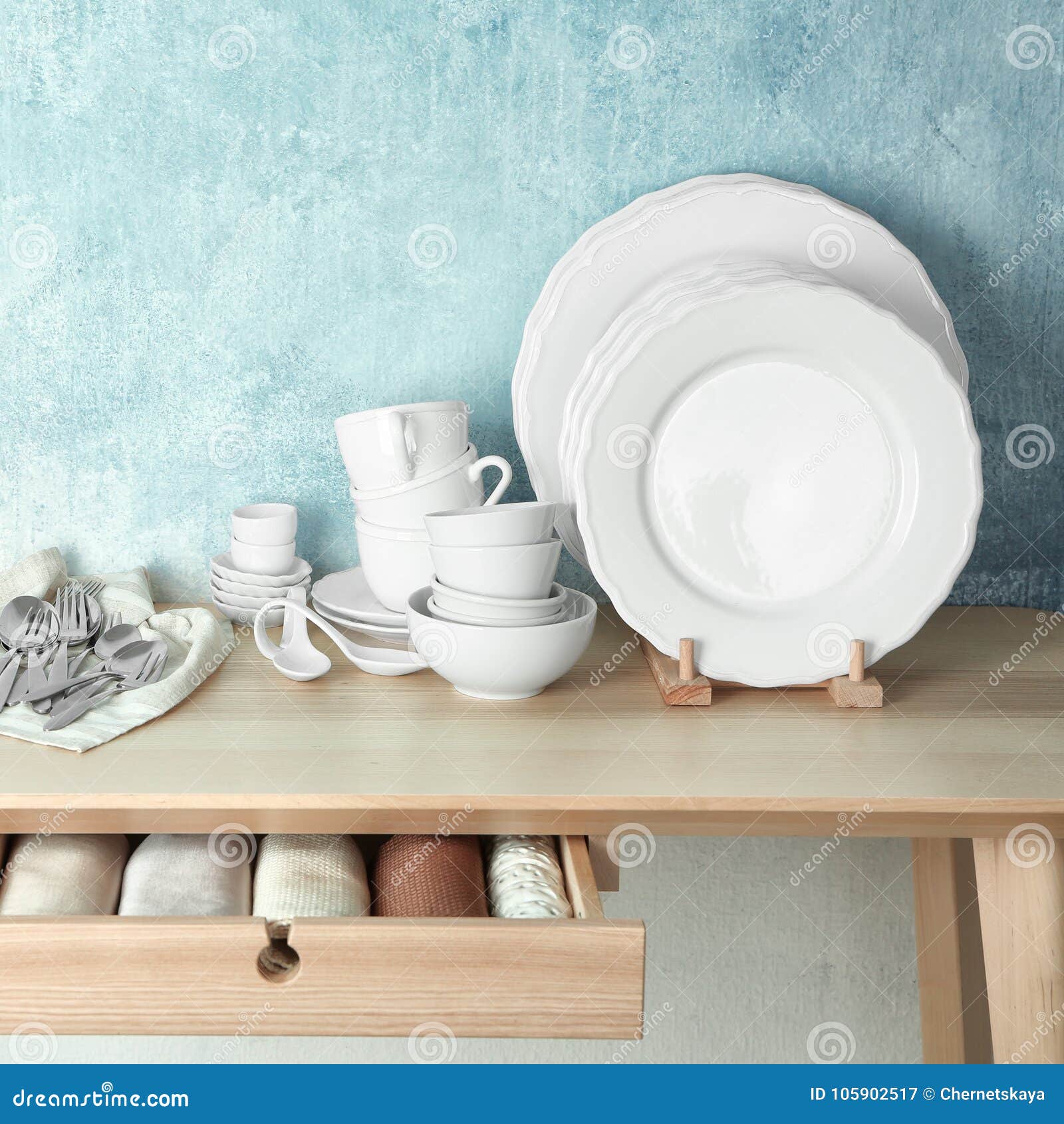 Set of tableware on table stock image. Image of domestic 105902517