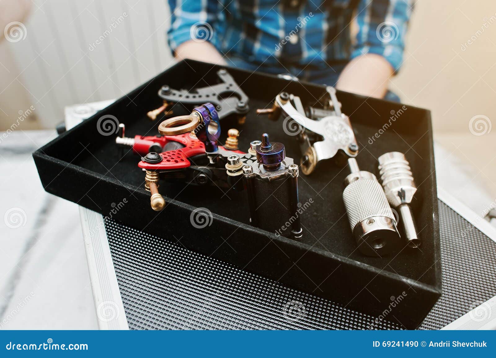 Set Of Tattoo Machines And Devices At Black Box Background Tattoo