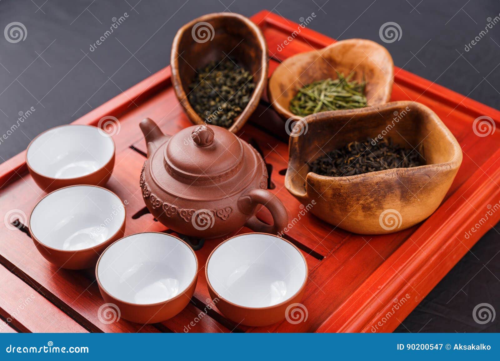 Set of Teapot, Three Kinds of Tea and Four Bowls Stock Image Image of
