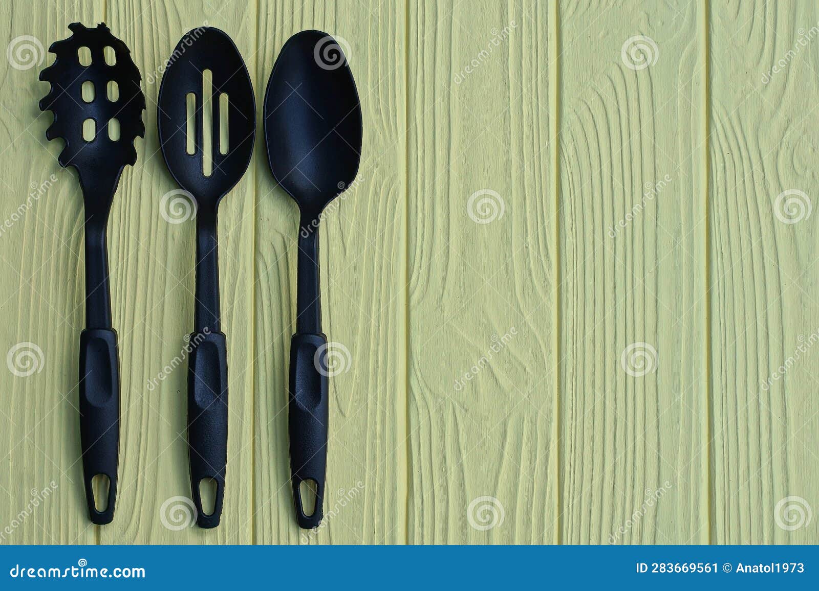 A Set of Three Black Plastic Kitchen Utensils Stock Image Image of