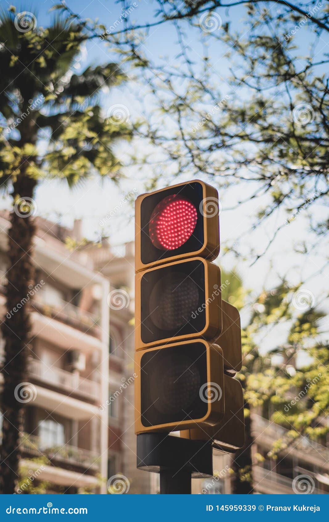 Set of Traffic Lights in Europe Red - Seen Against Backdrop of Buildings Blue Sky. Stock - Image of landmark, boulevard: 145959339