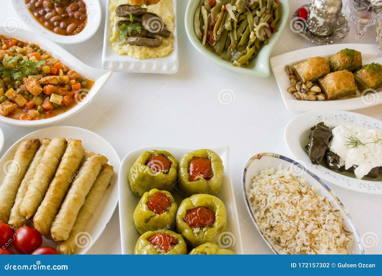 setting feast dinner table`bayram sofrasi`with traditional turkish foods
