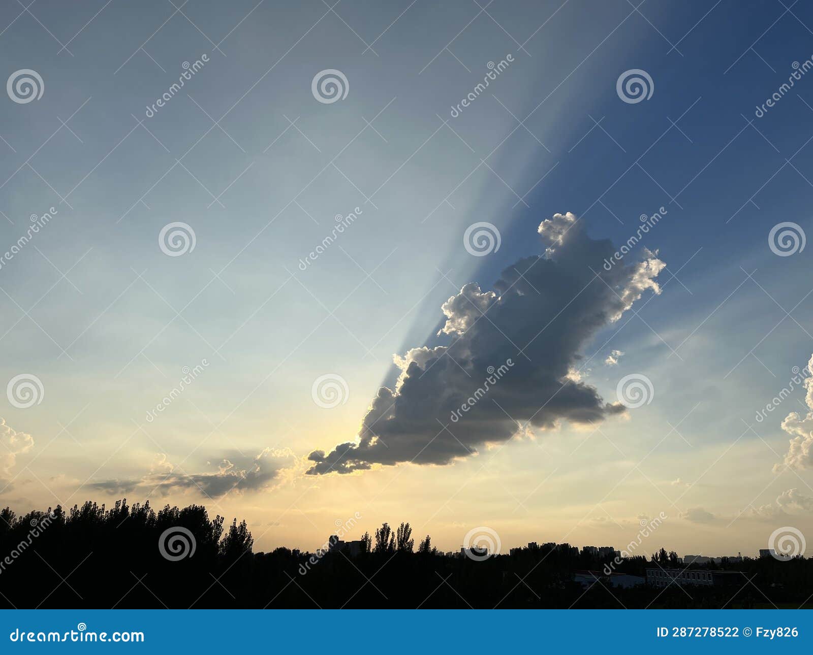 the setting sun casts its golden rays, the evening sky is adorned with vibrant hues as the twilight deepens