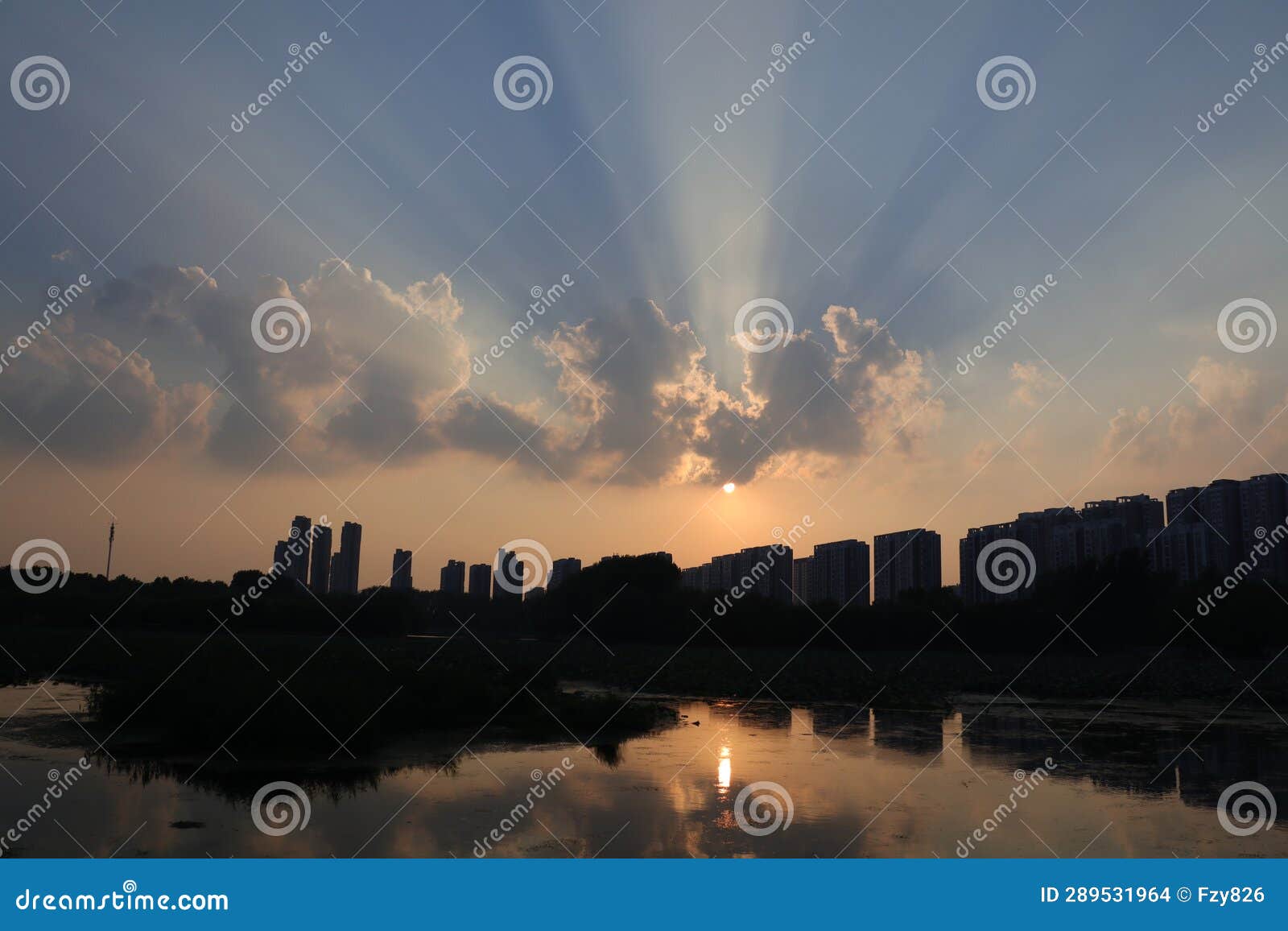 the setting sun casts its golden rays, the evening sky is adorned with vibrant hues as the twilight deepens
