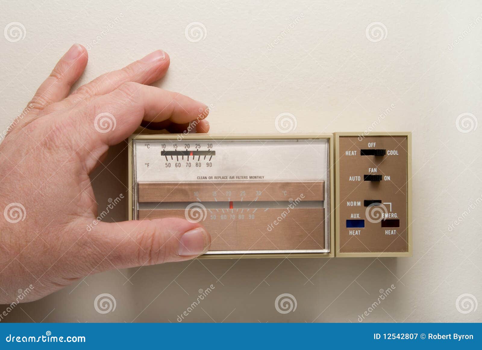 Setting a Thermostat To Cool Stock Image - Image of conditioning