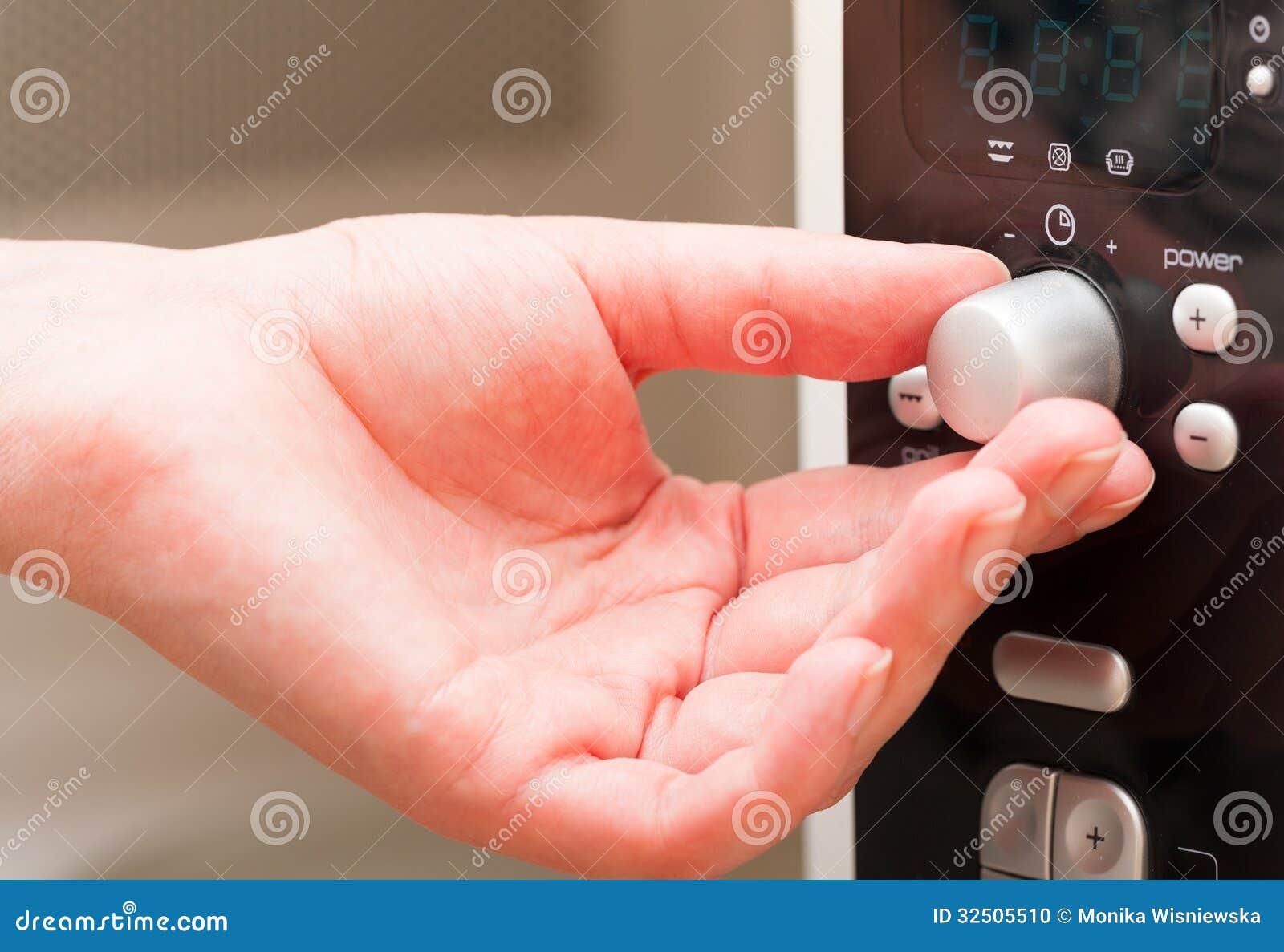 Setting a Timer on the Microwave Oven Stock Photo Image of male, food