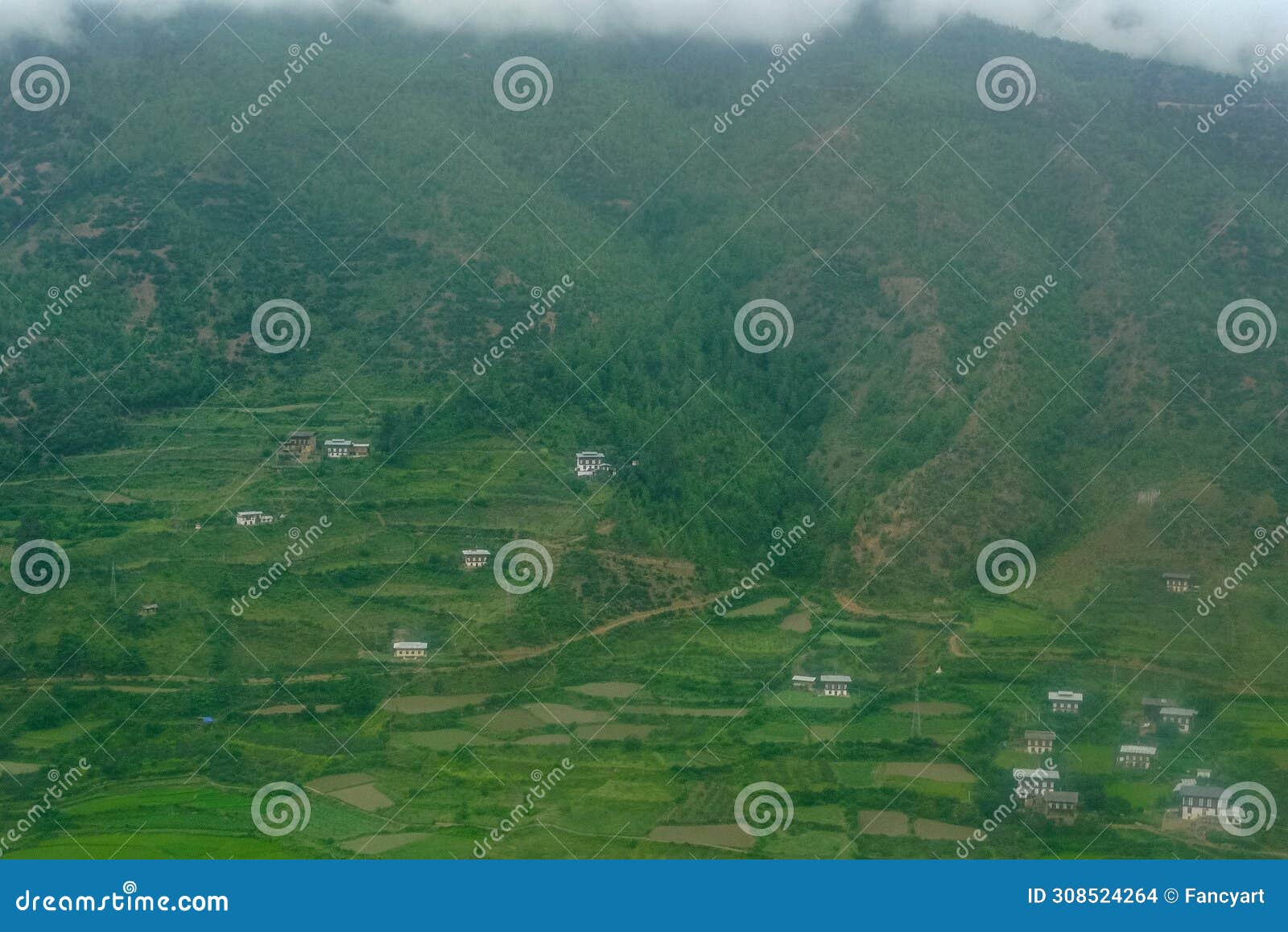 settlement within mountainous landforms in paro city bhutan south asia