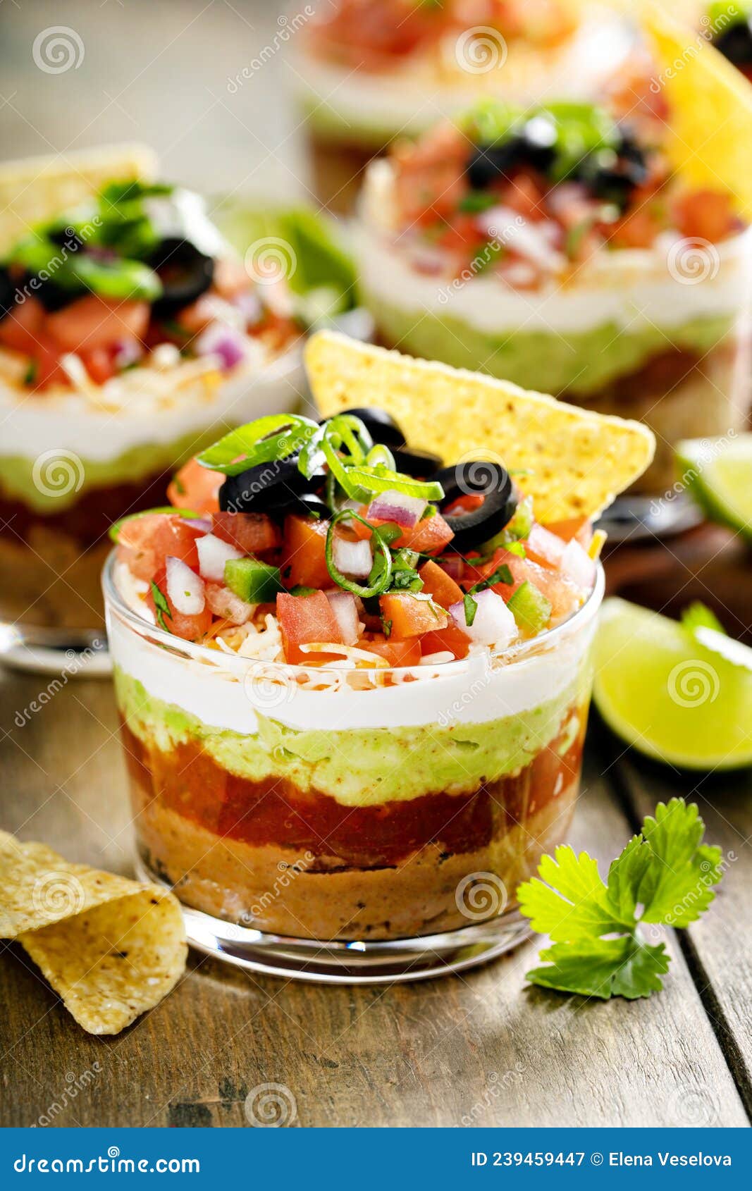 Seven Layer Dip in Individual Cups, Mexican Appetizer Stock Image