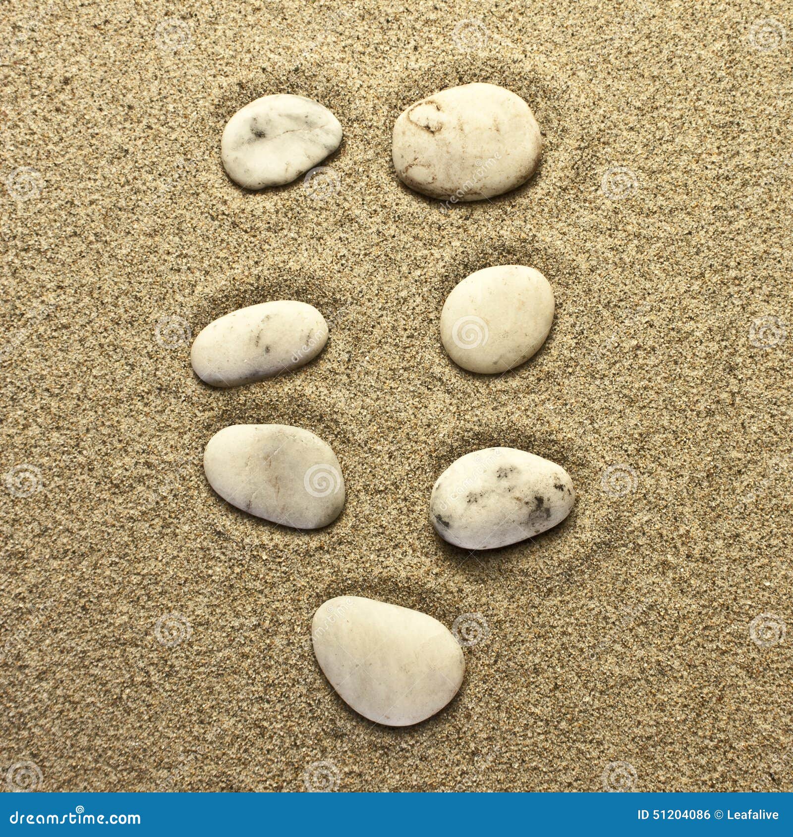 Seven stones in the sand stock photo. Image of golden 51204086