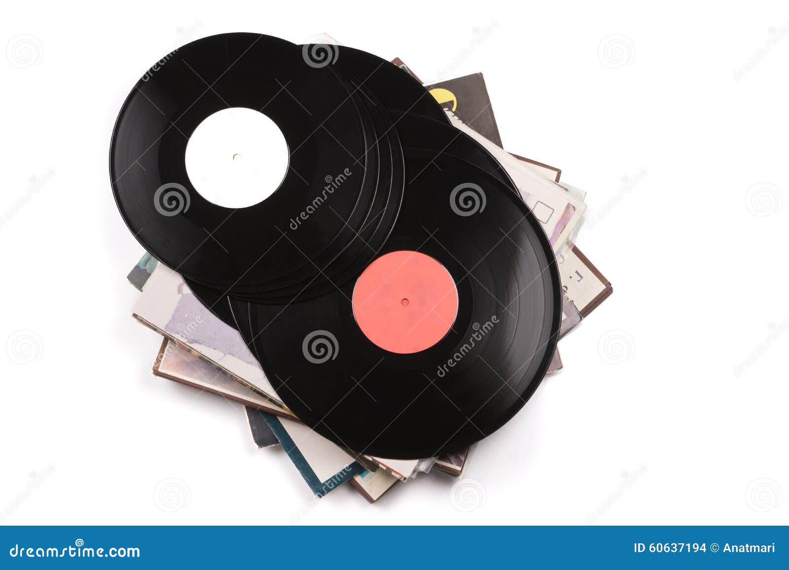 Several Big Black Vinyl Records Lying on the Cardboard Covers. Stock