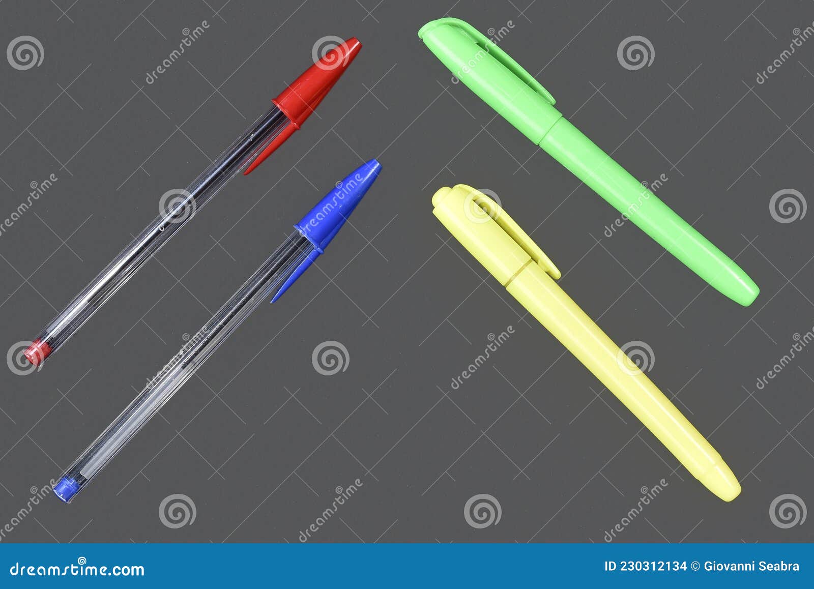 several colored pens used in schools and offices  with space for text