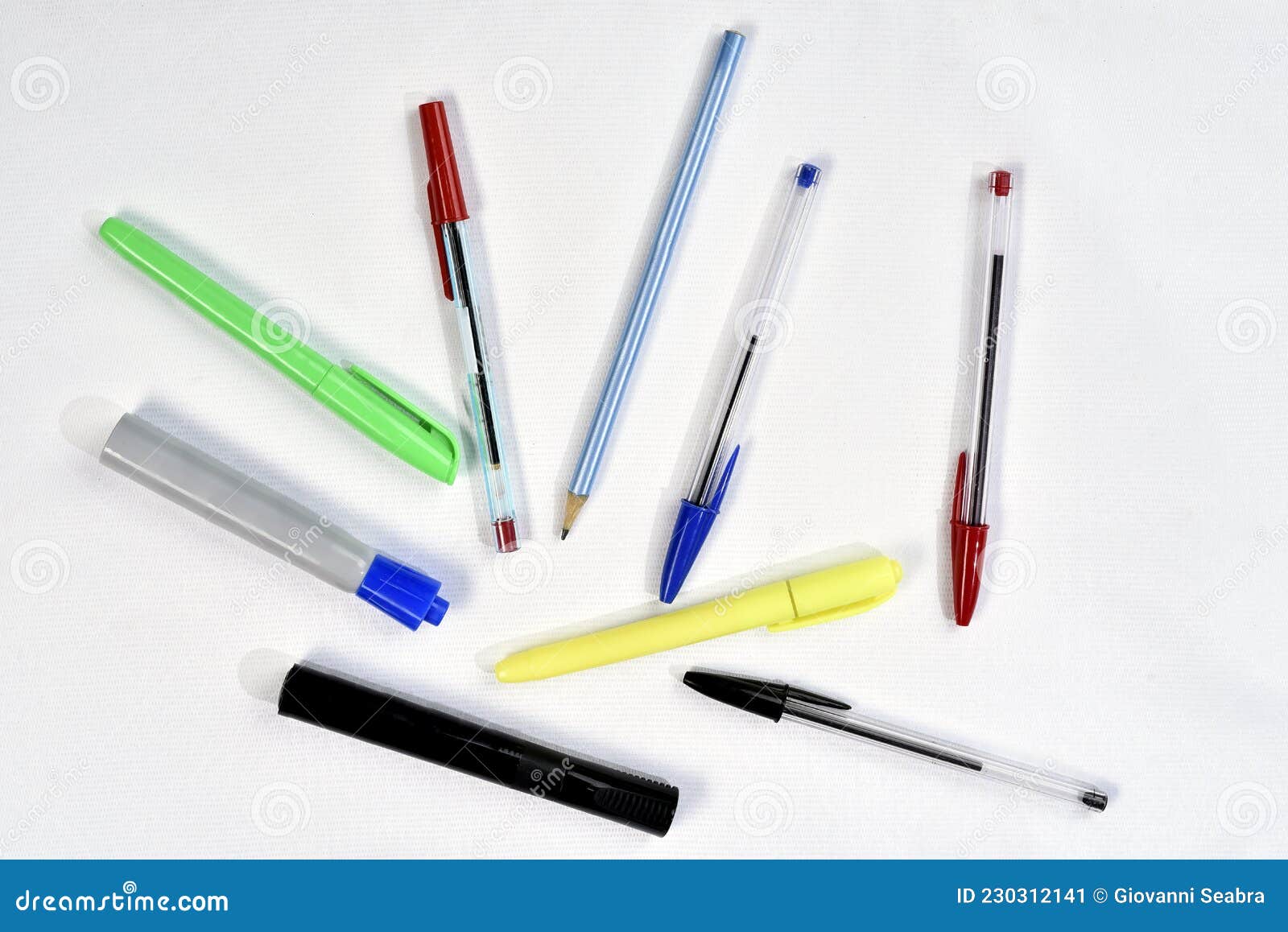 several colored pens used in schools and offices  with space for text