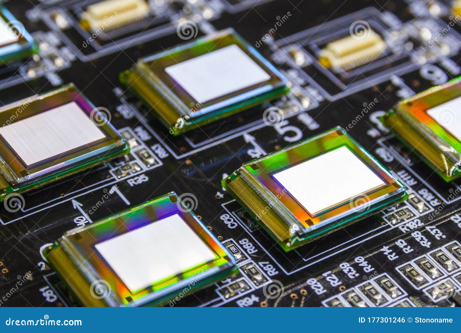 several microdisplays bright of white color on the test station. monitors glow brightly of white color close up.rainbow