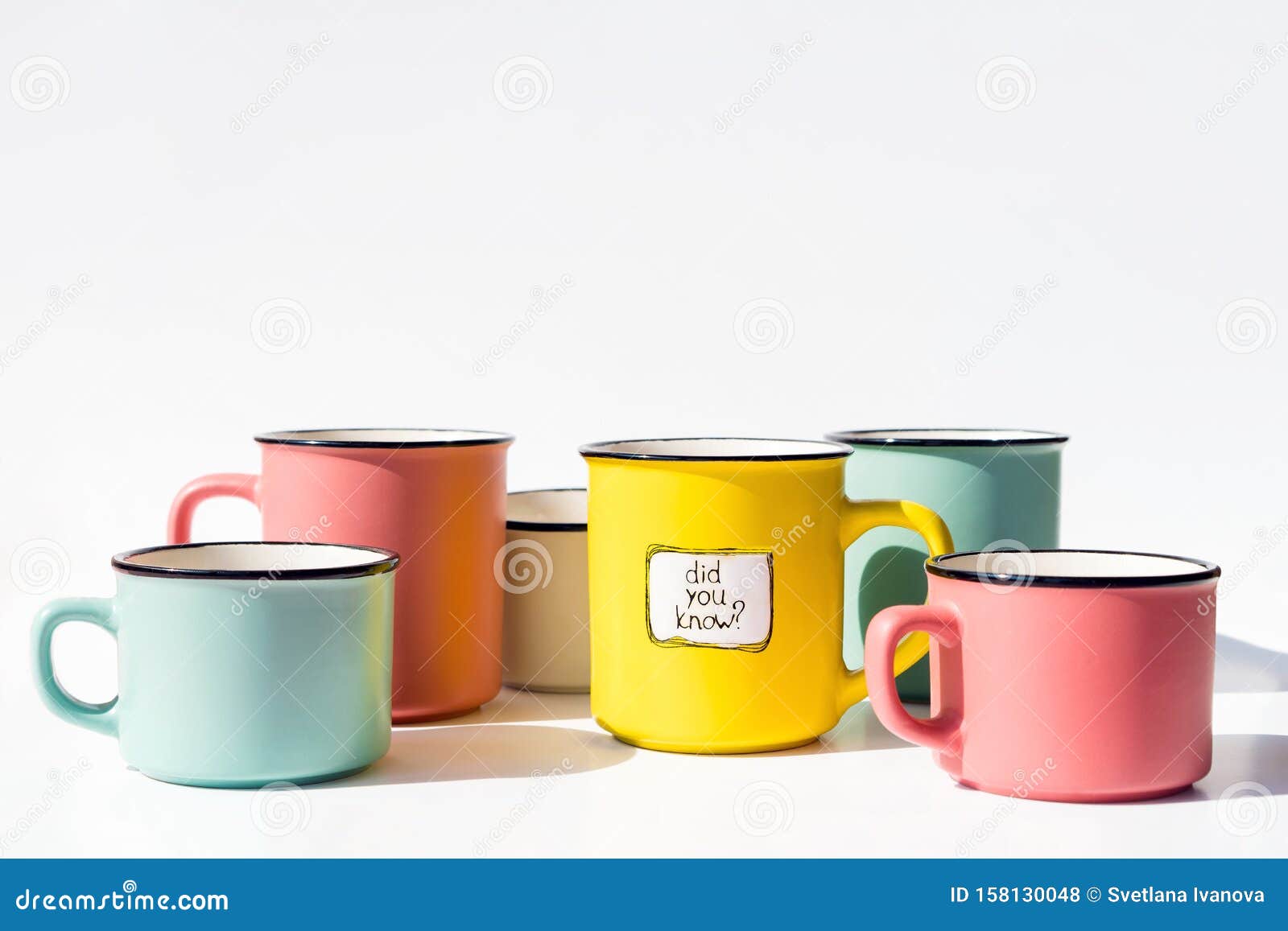 Several Multicolored Coffee Cups And One With The Inscription Did You