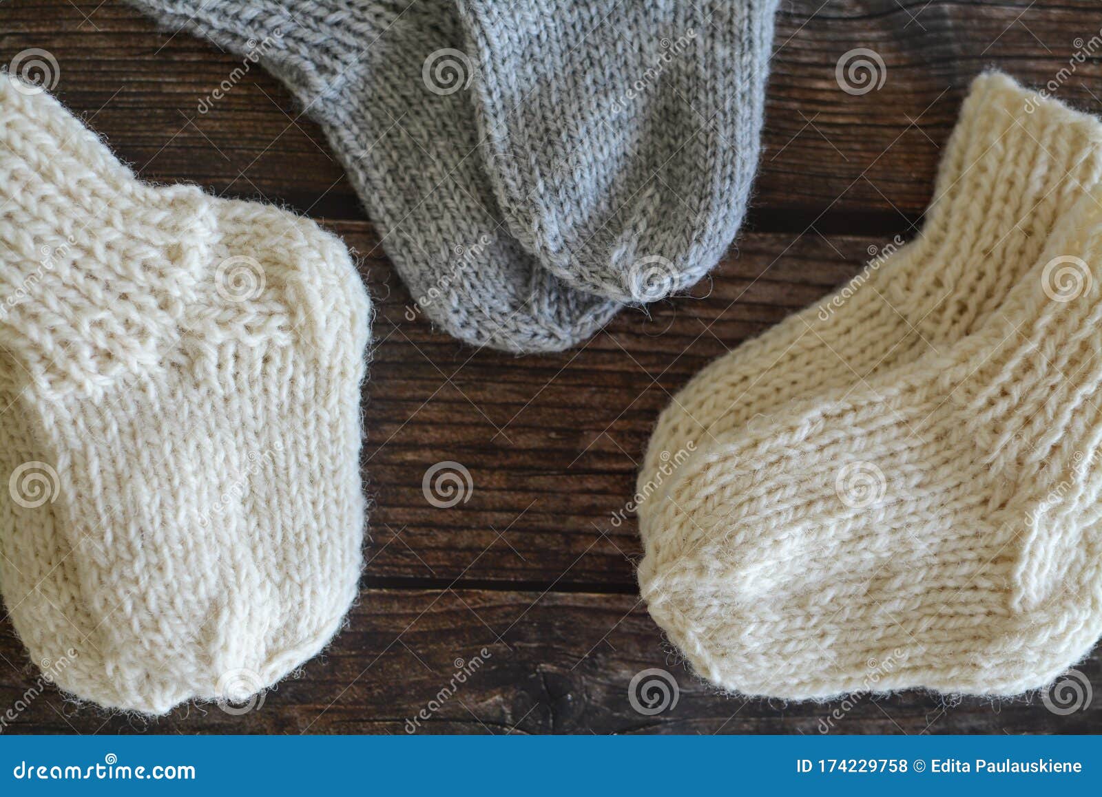 Several Pairs of Woolen Newborns Socks, on Dark Background Stock Photo ...