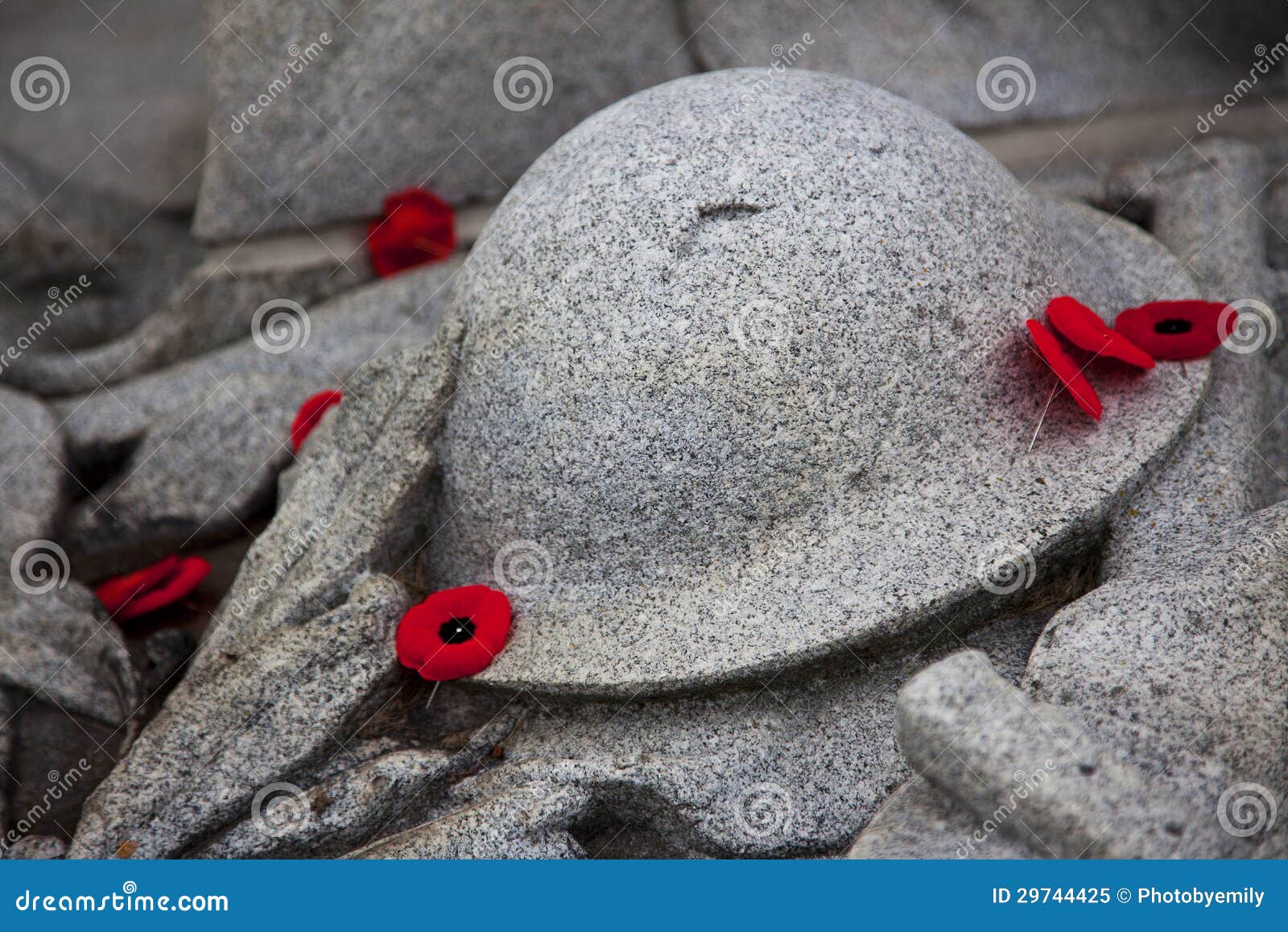poppies around war memorial