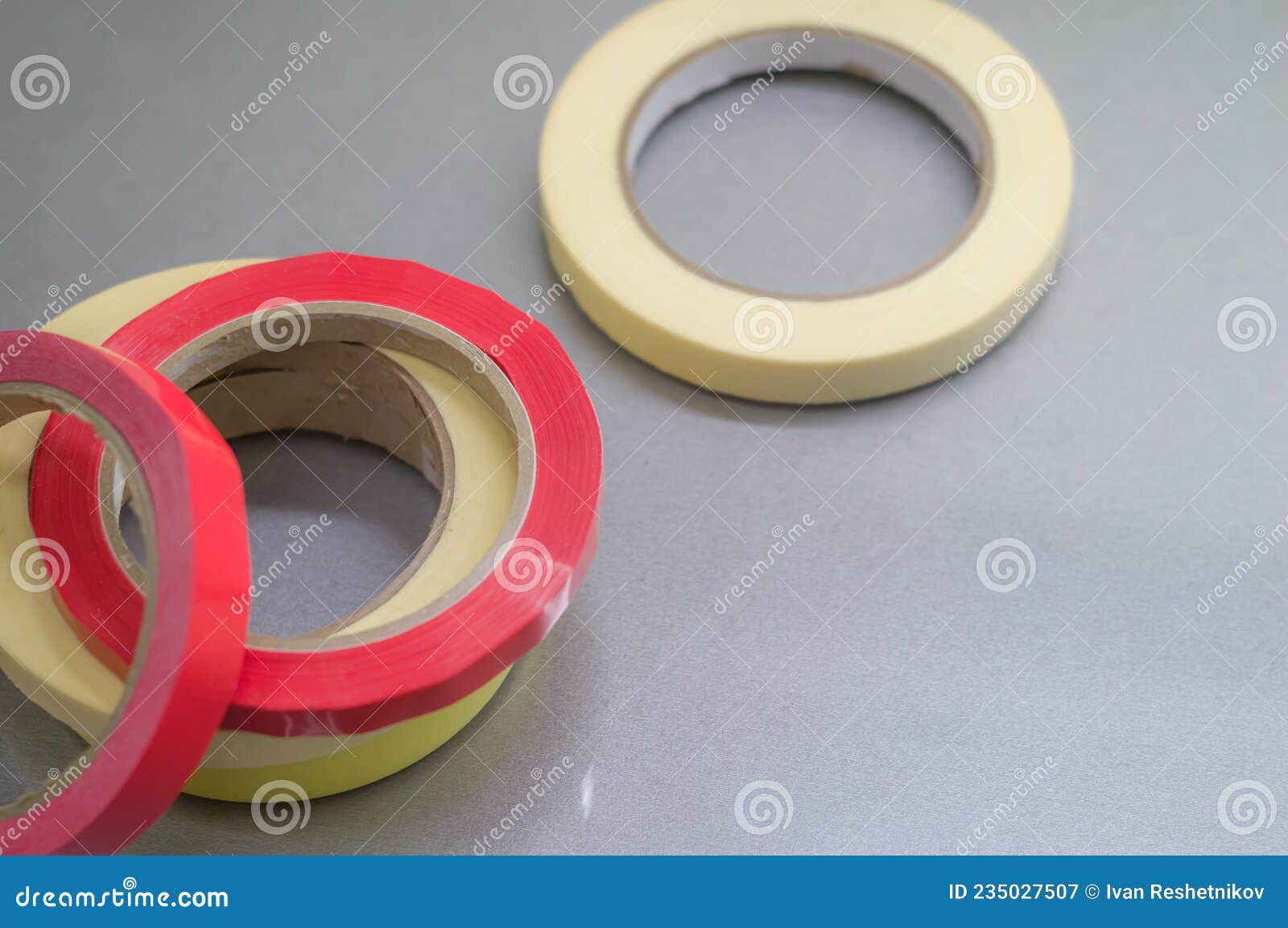 Several Rollers of Adhesive Tape for Different Purposes. Paint and Duct