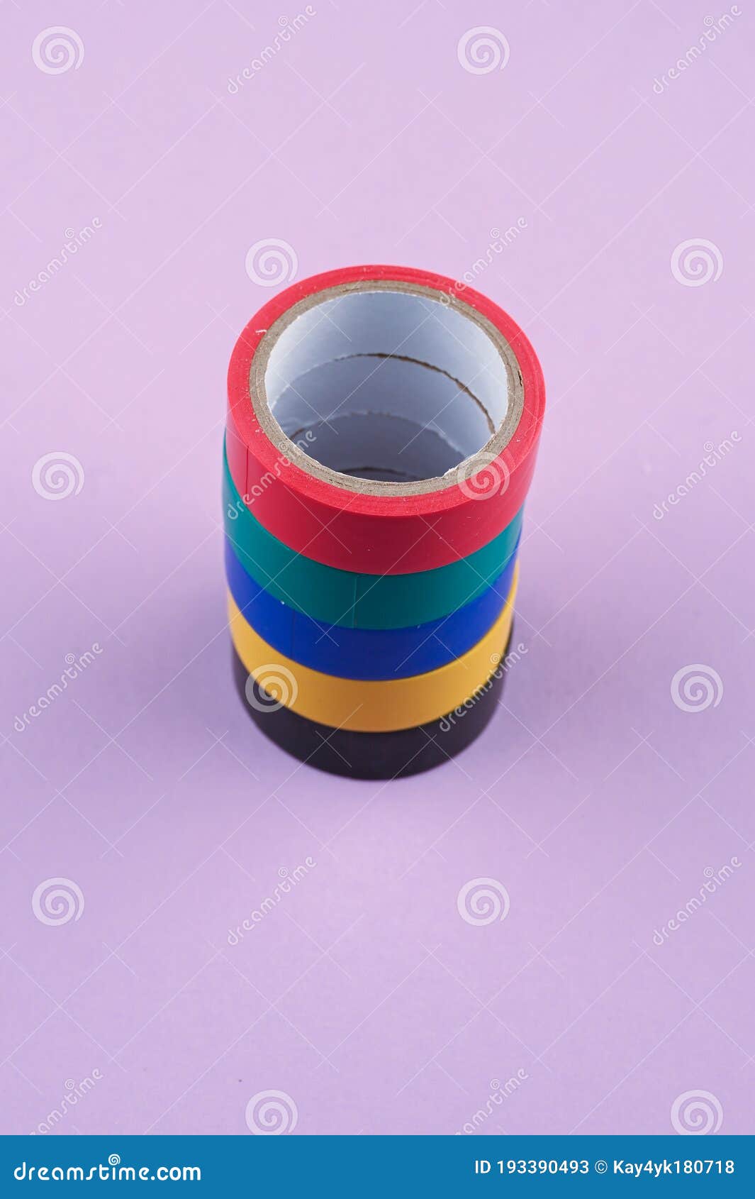 Several Round Rolls of Colored Plastic Tape Lie in a Row Stock Image