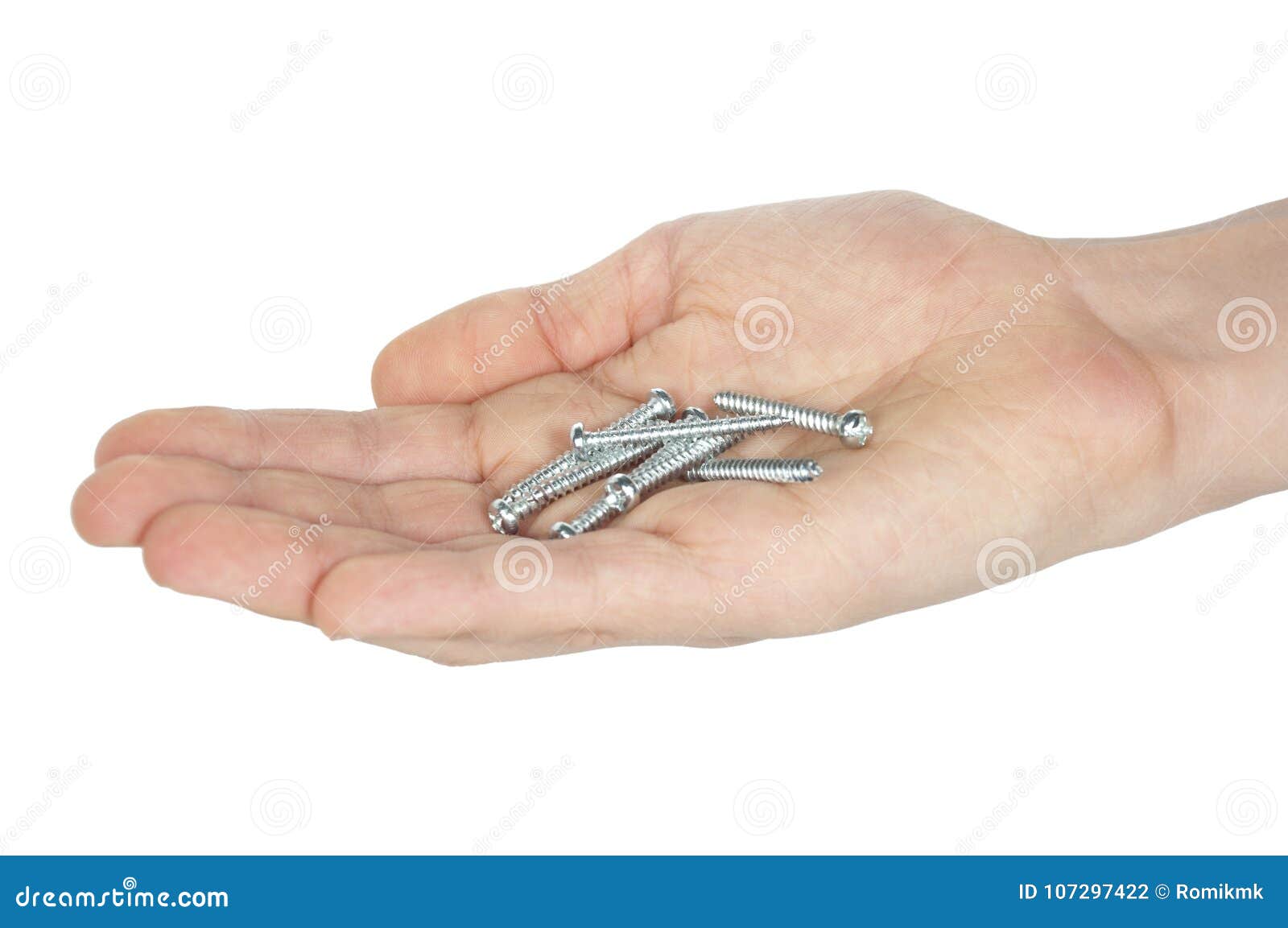 several self-tapping screws in hand 