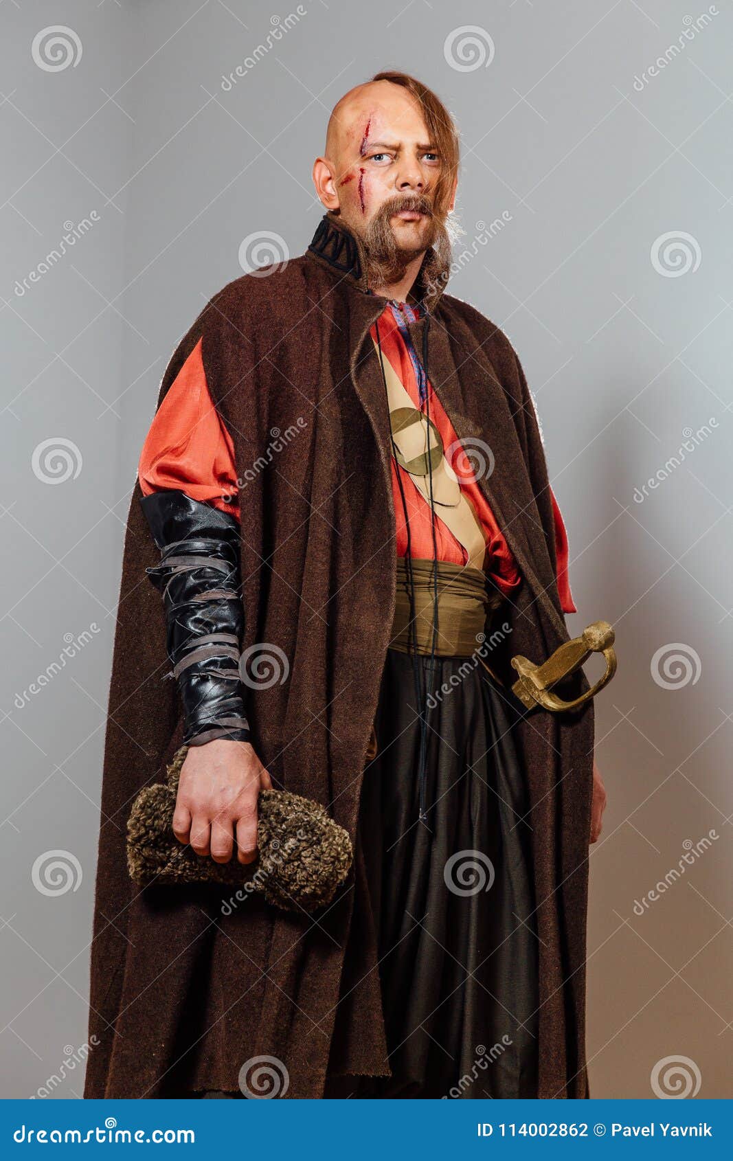 Severe Warrior Russian Cossack, Face in Scars, Bald. Bled Blood. Saber in  Sheath Stock Photo - Image of clothes, armour: 114002862