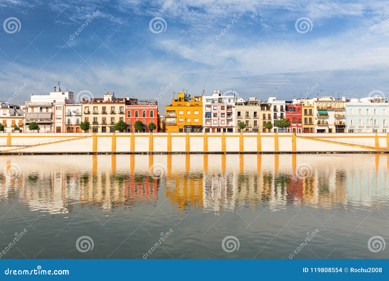 seville, spain, waterfront view to the historic architecture of the triana district