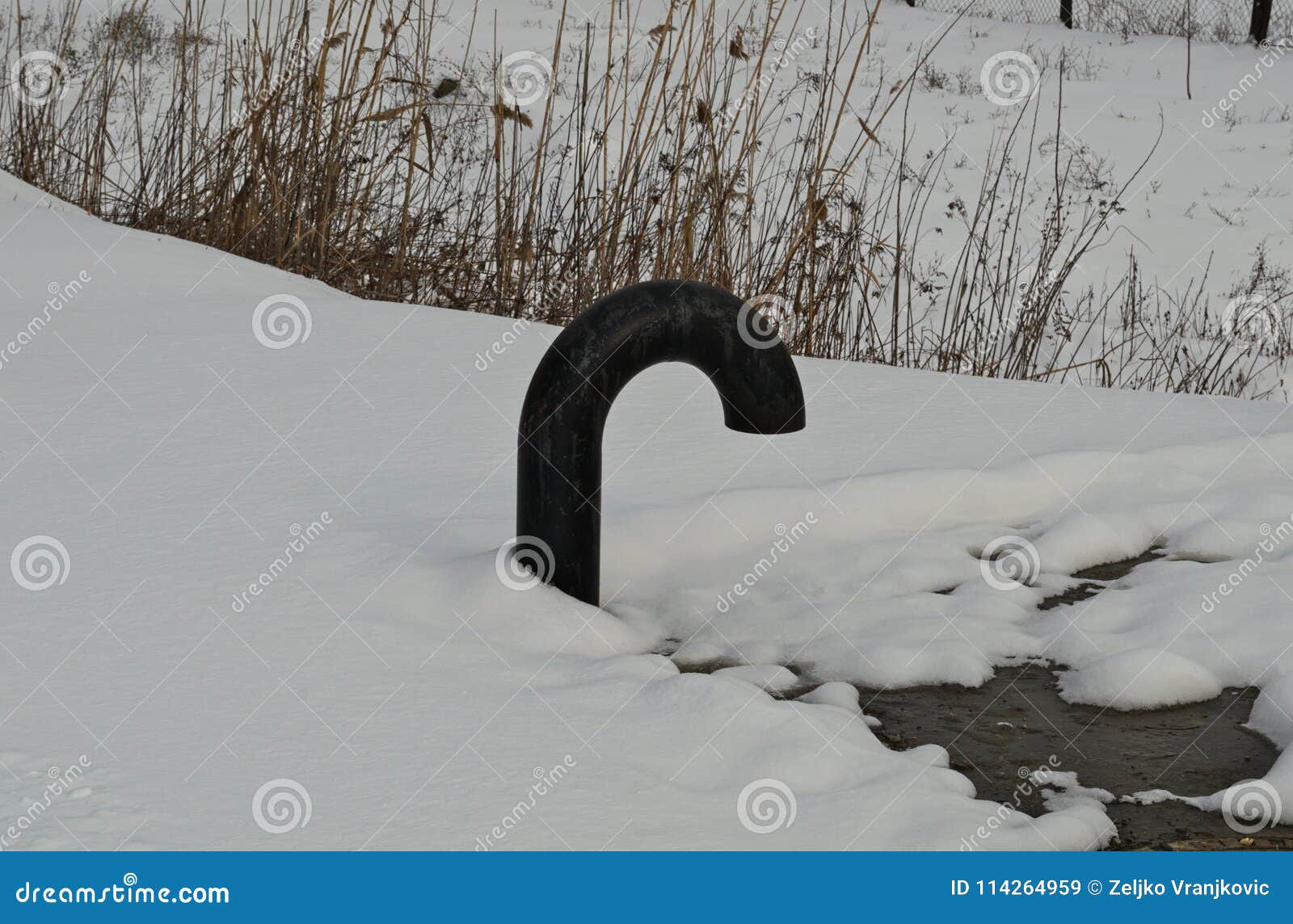 Sewage Exhaust Pipe Outside with Snow All Around Stock Image Image of