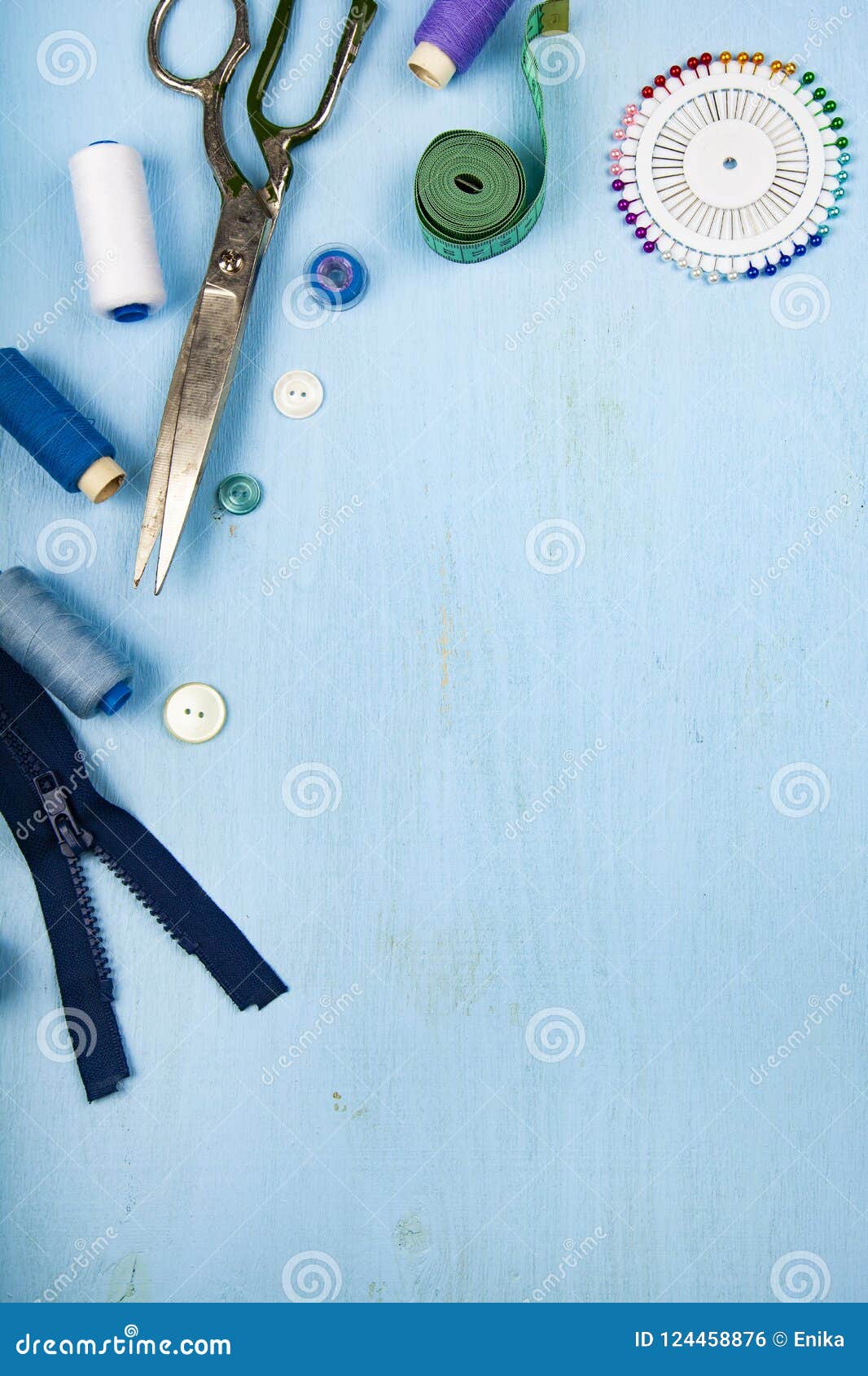 Sewing Accessories on a Blue Background Stock Photo - Image of buttons ...
