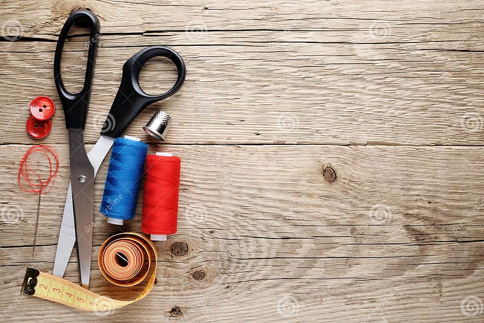 Sewing accessories on wood stock photo. Image of objects 26694070
