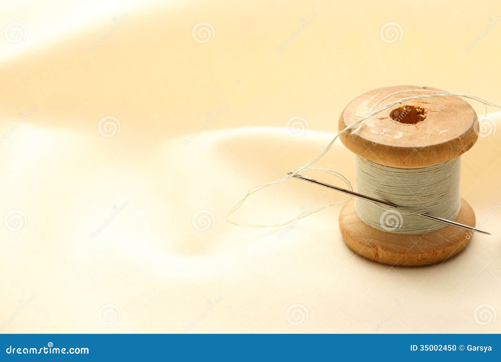 Sewing bobbin and needle stock photo. Image of small 35002450