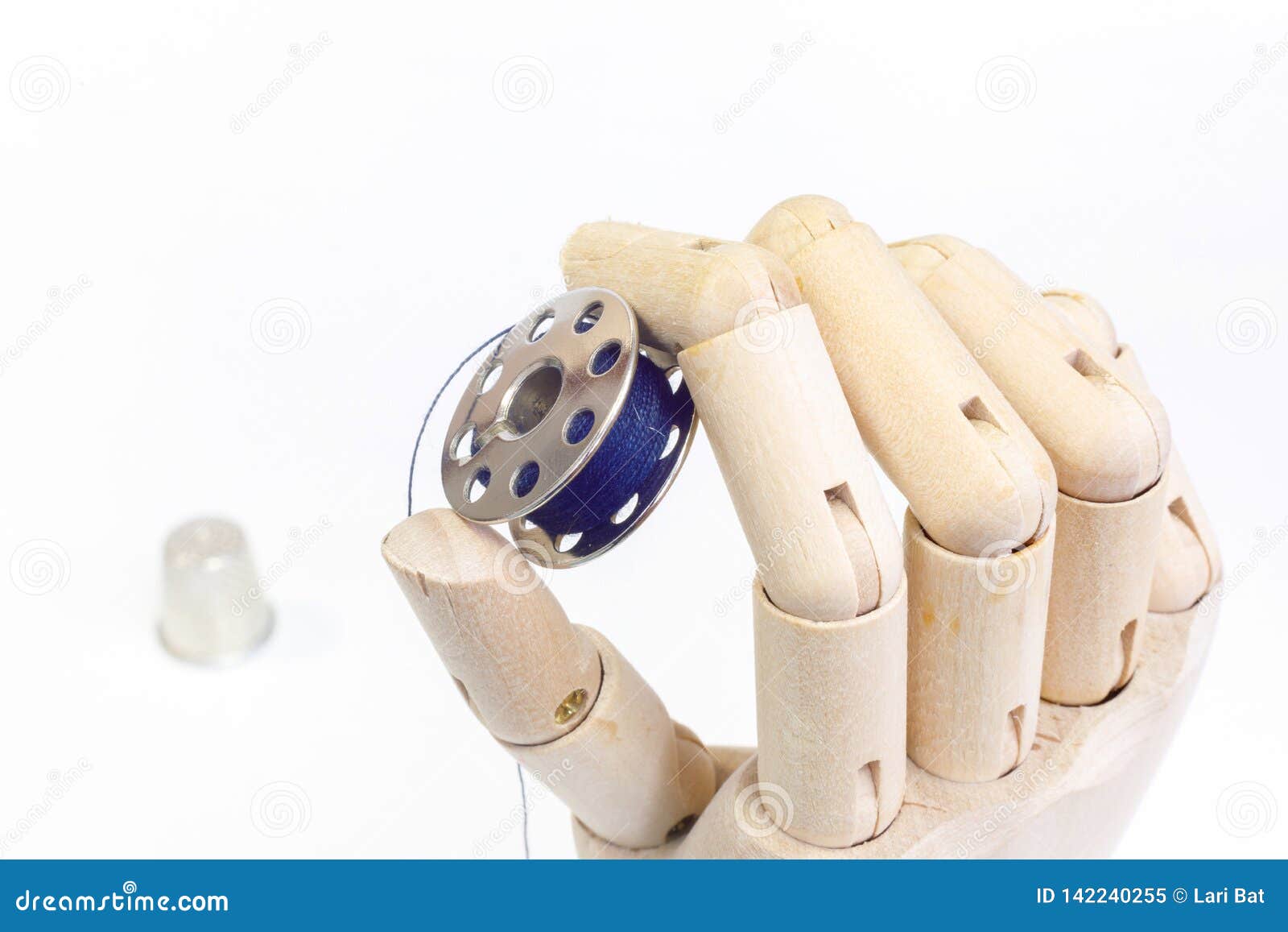 Sewing Bobbin in Wooden Hand Stock Image Image of silk, clothing 142240255