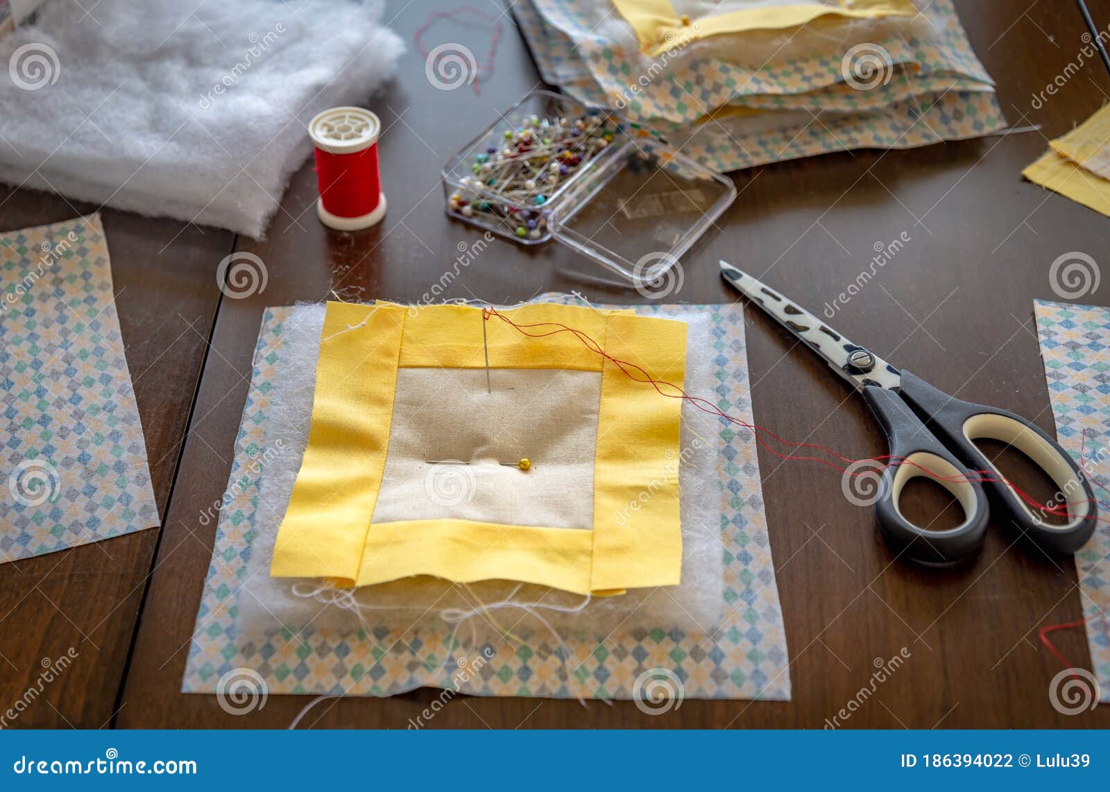 Sewing of Handmade Patchwork Hot Pads with Scissors, Pool of Threads